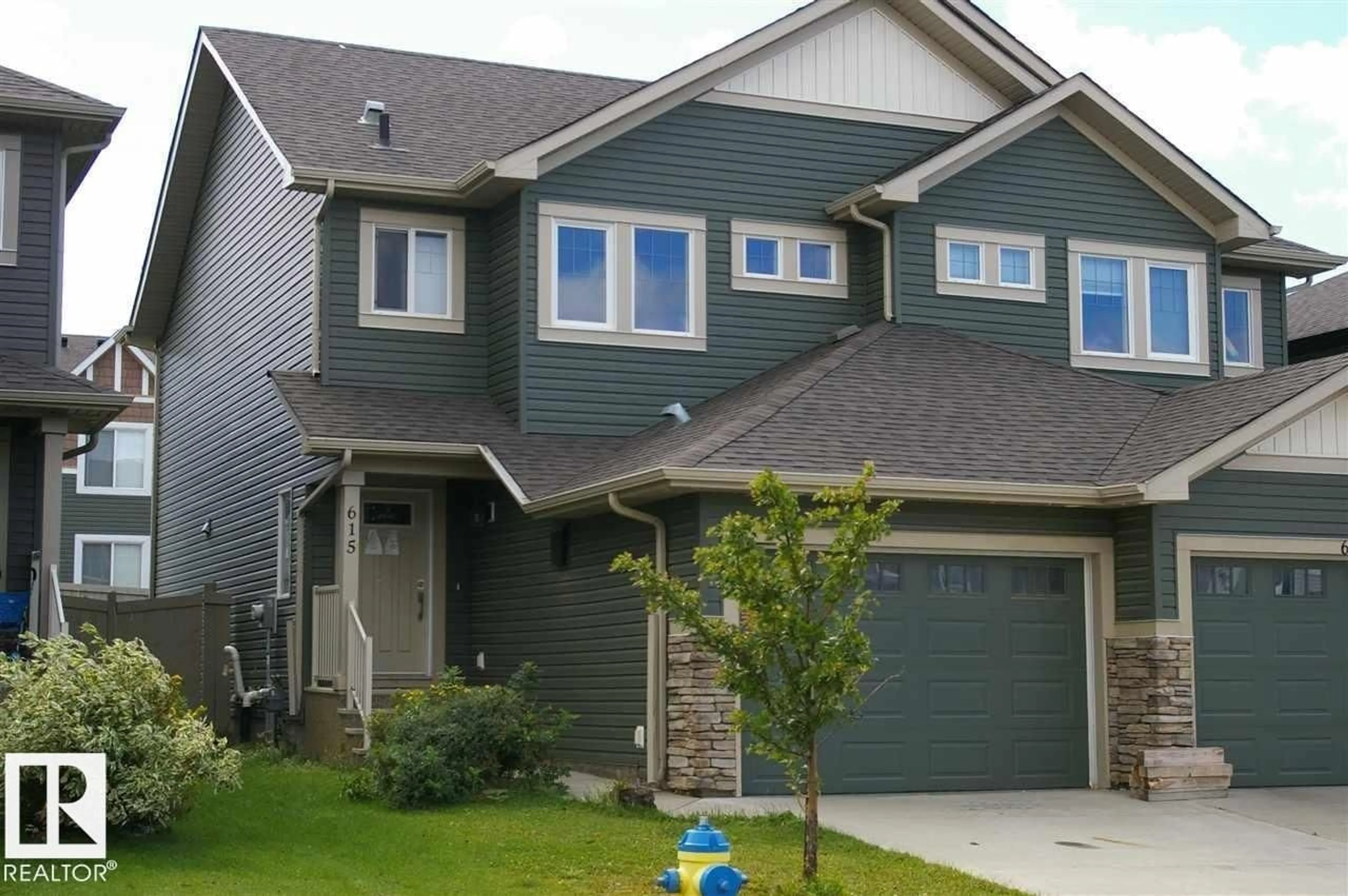 Home with vinyl exterior material, street for 615 40 AV, Edmonton Alberta T6T0T5
