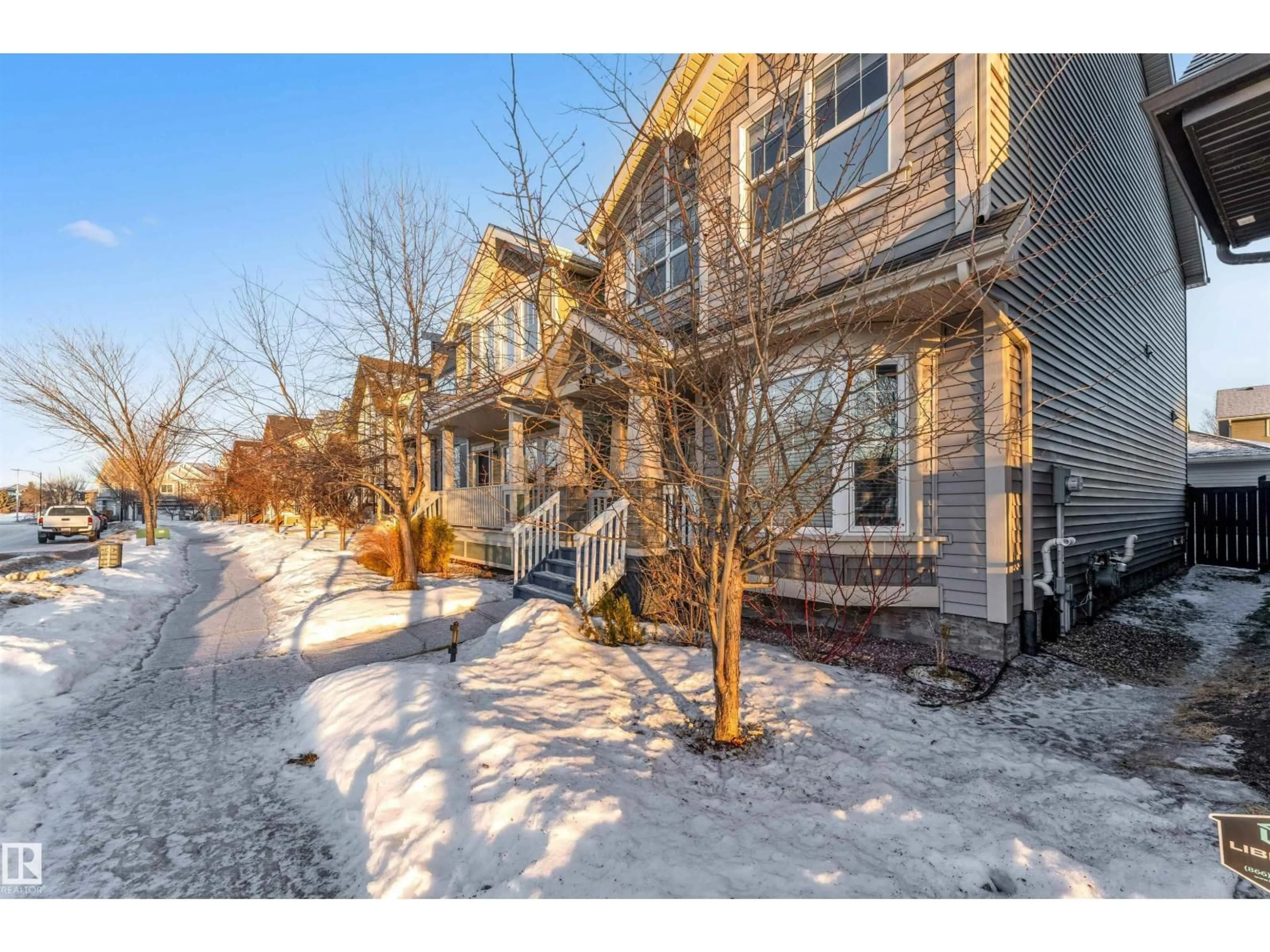 A pic from outside/outdoor area/front of a property/back of a property/a pic from drone, street for 3120 PAISLEY RD, Edmonton Alberta T6W2W8