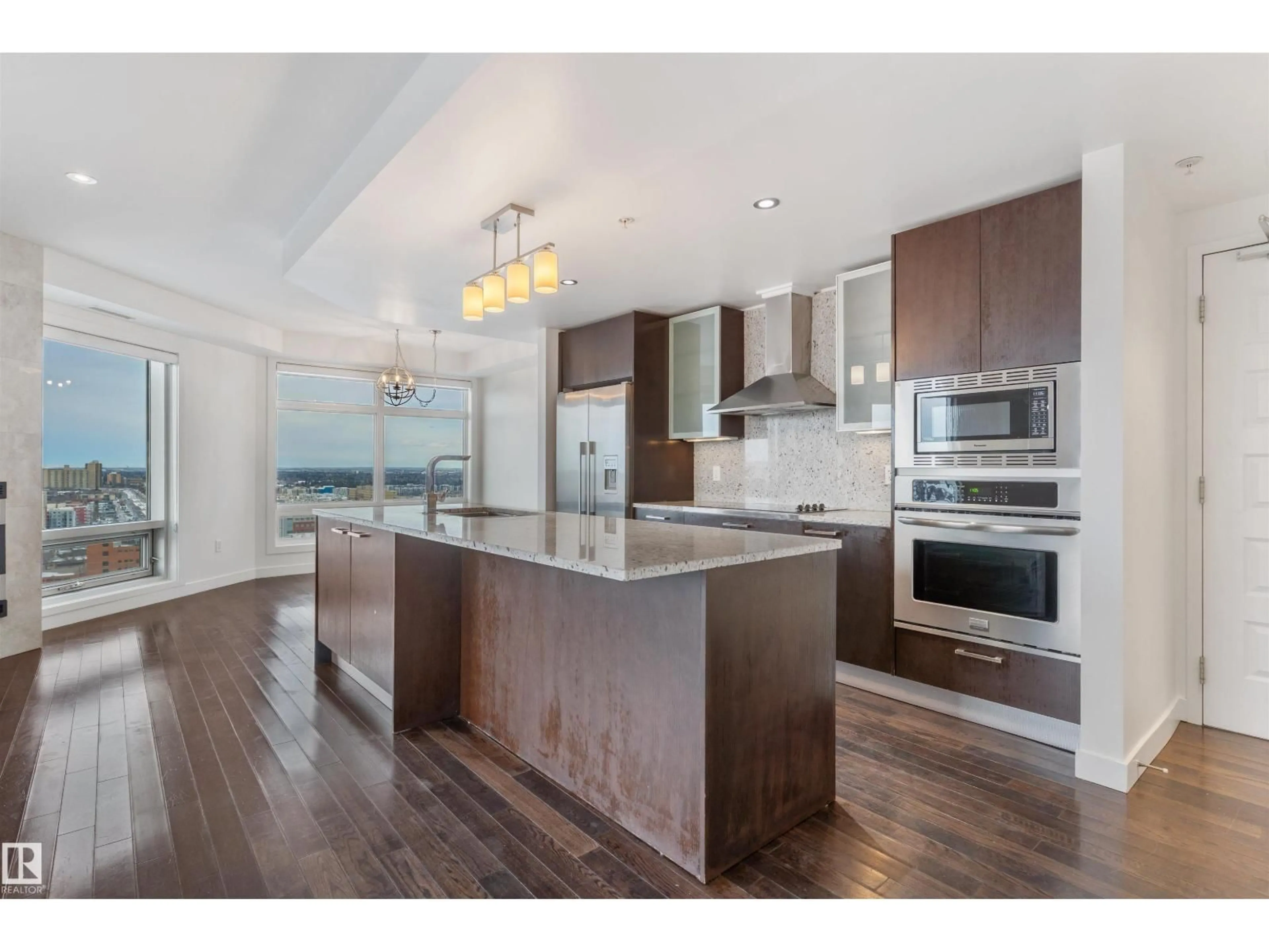 Open concept kitchen, wood/laminate floor for 10388 - 1901 105 ST, Edmonton Alberta T5J0C2