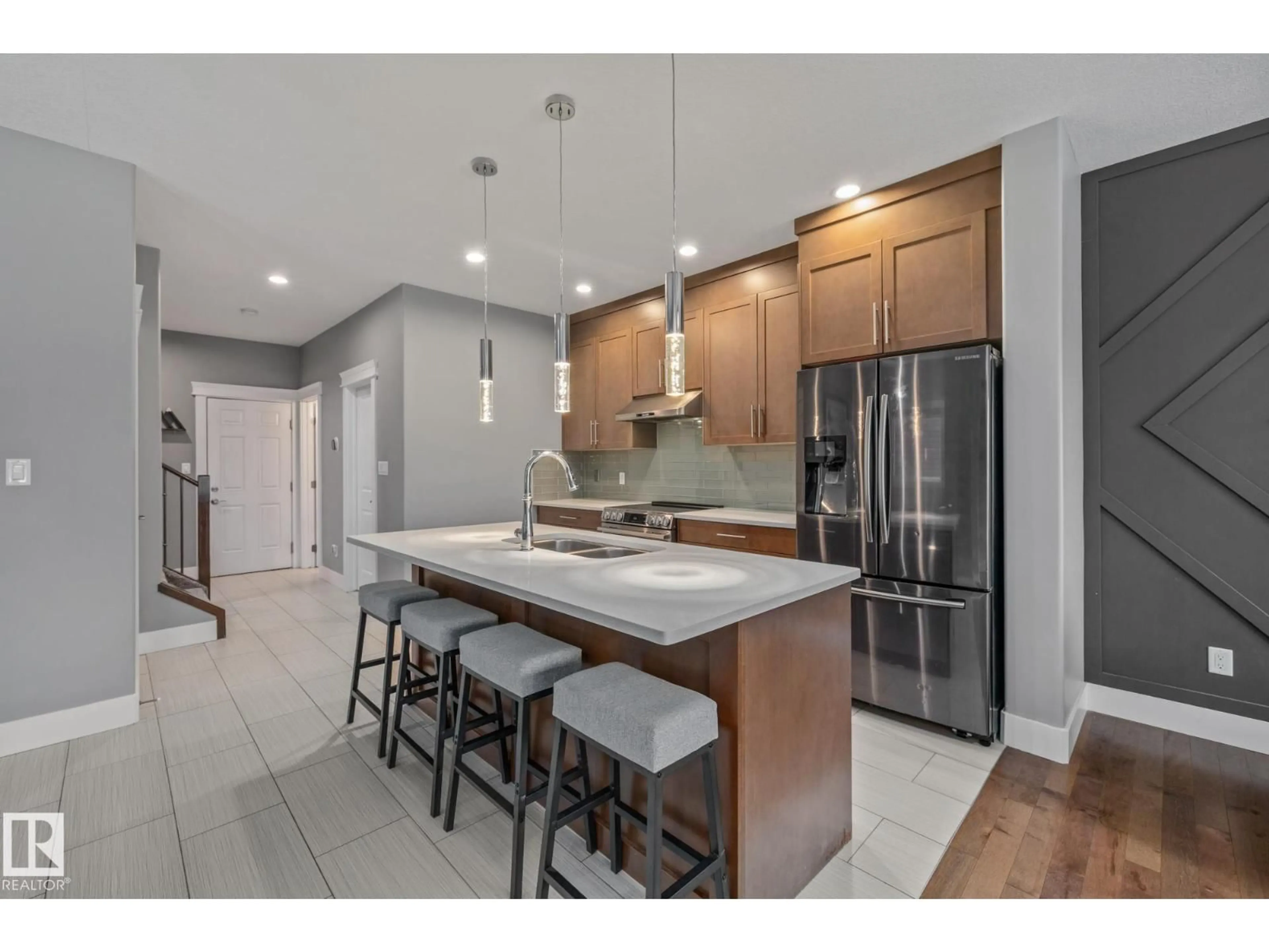 Open concept kitchen, ceramic/tile floor for 16807 60 ST, Edmonton Alberta T5Y3S6