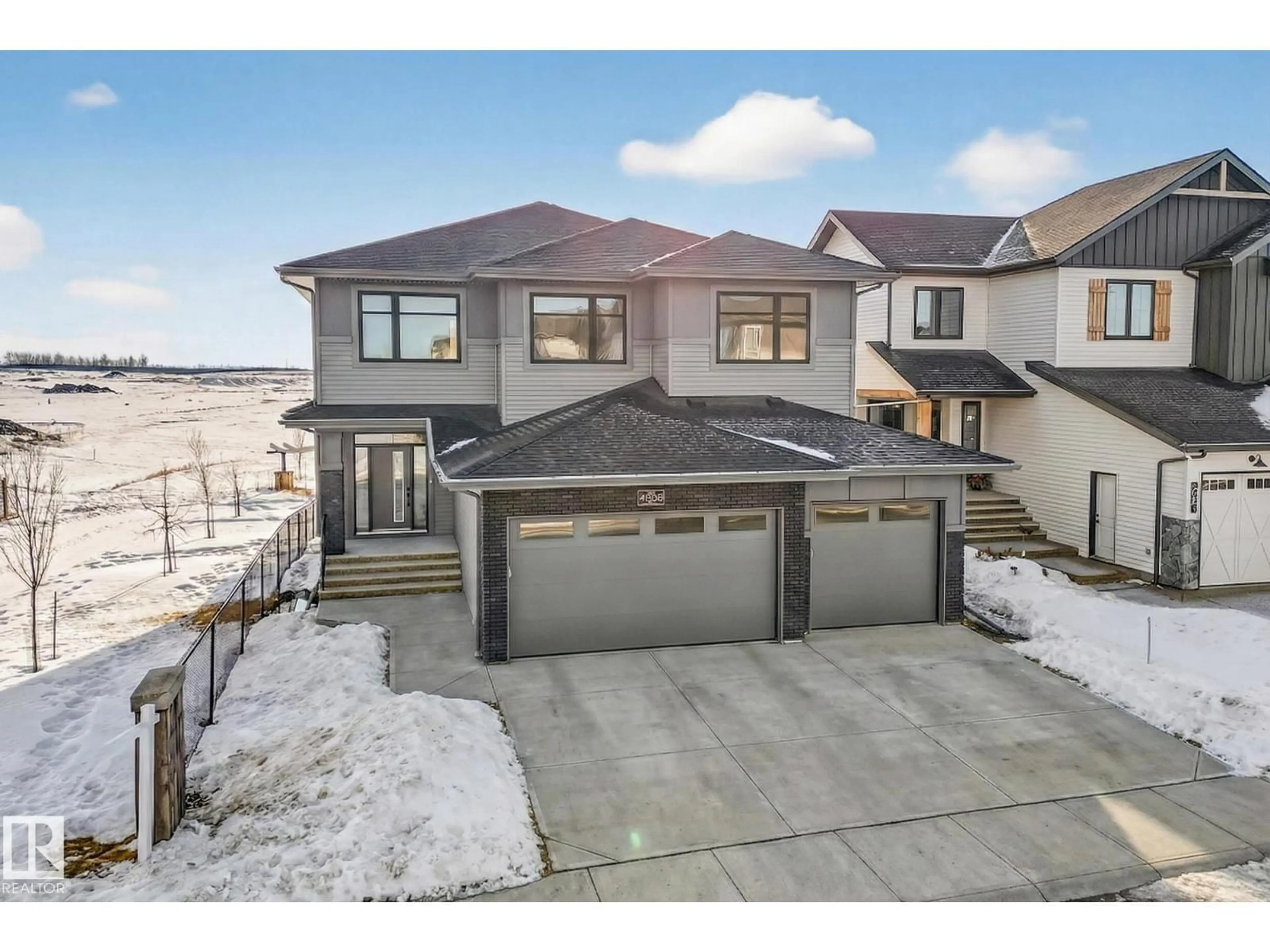 A pic from outside/outdoor area/front of a property/back of a property/a pic from drone, street for 4005 40 AVE, Beaumont Alberta T4X3C1