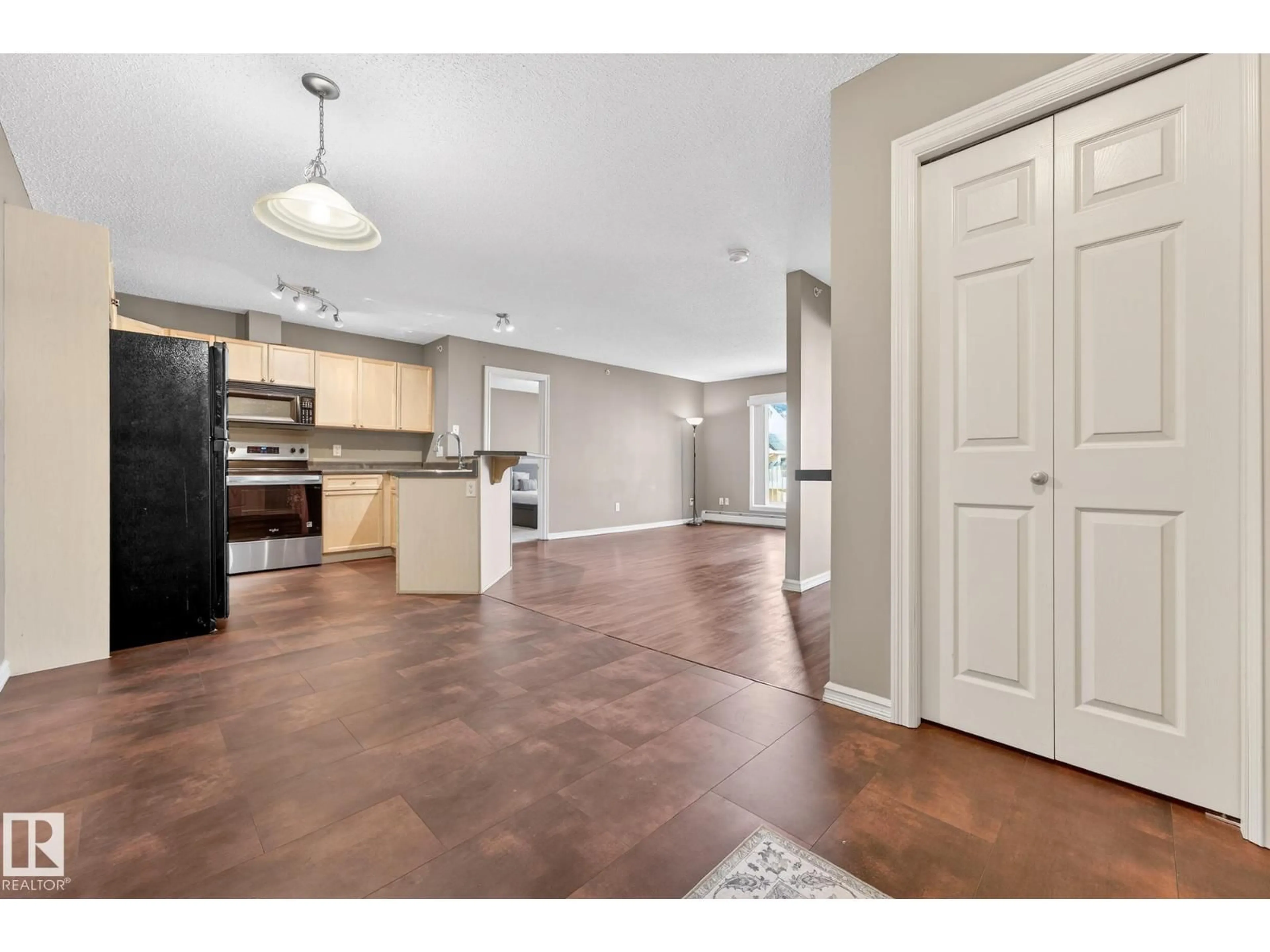 Open concept kitchen, ceramic/tile floor for #414 - 13710 150 AV NW, Edmonton Alberta T6V0B2