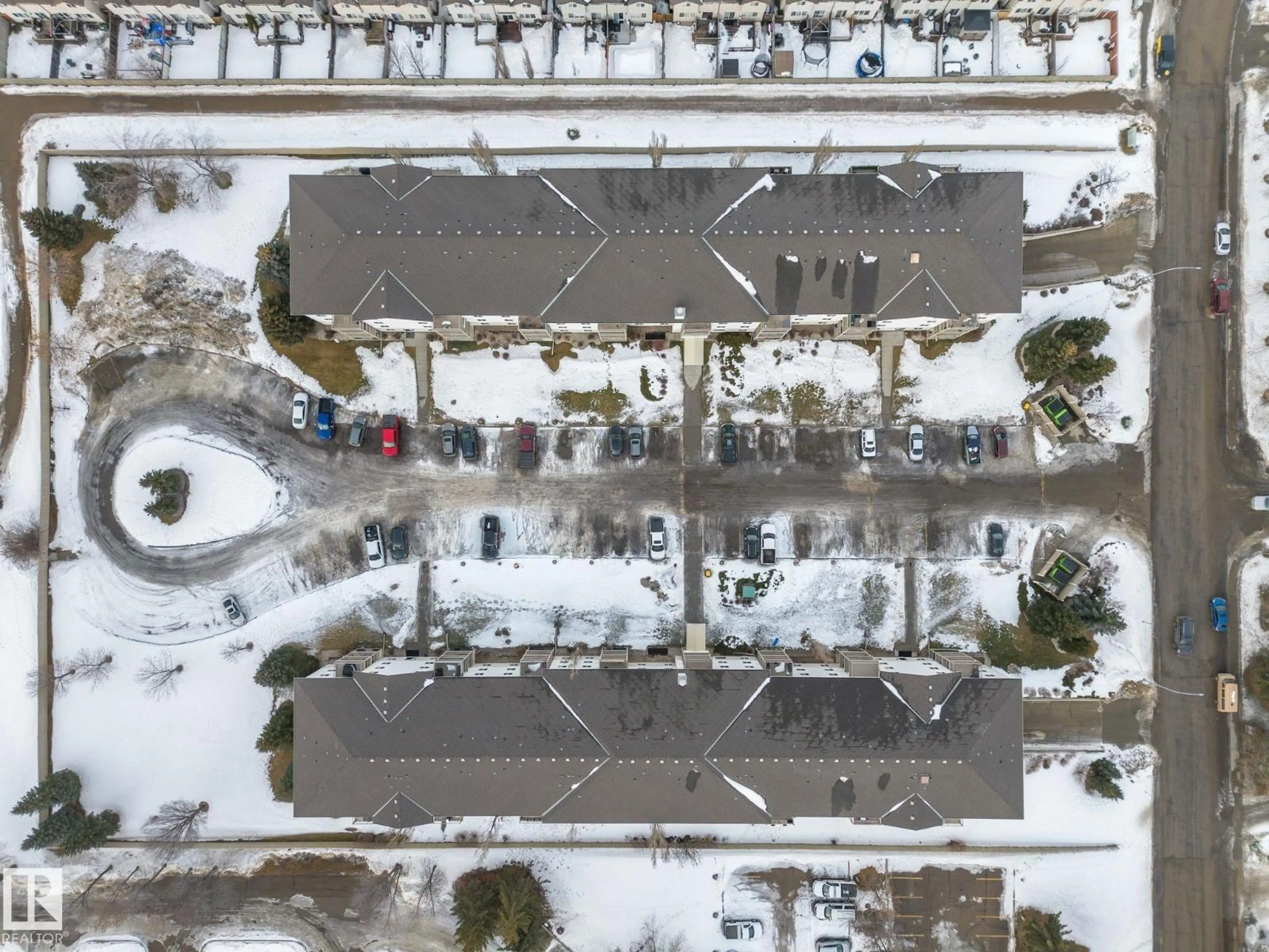 A pic from outside/outdoor area/front of a property/back of a property/a pic from drone, street for 209 - 4703 43 AV, Stony Plain Alberta T7Z2S7