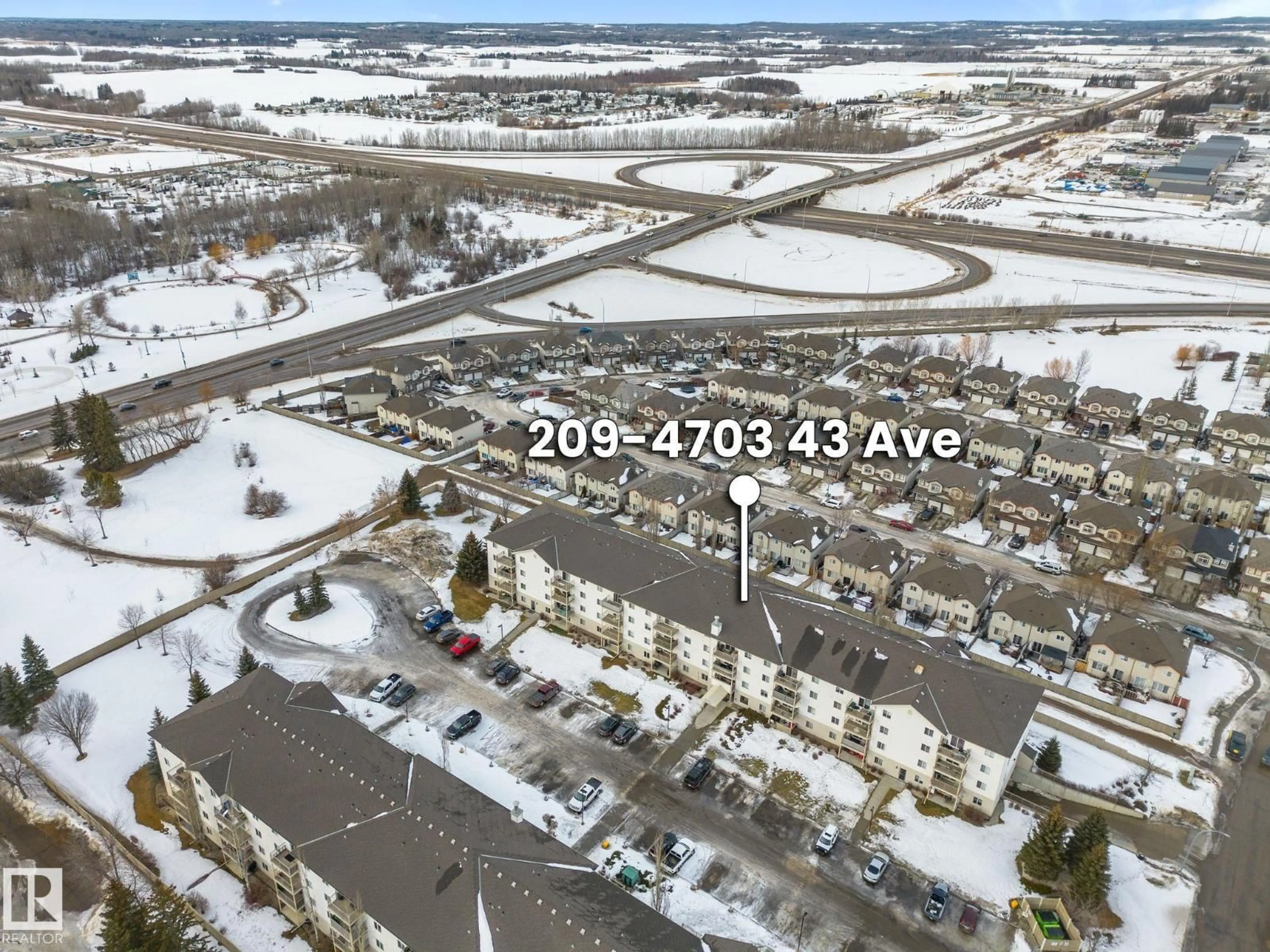 A pic from outside/outdoor area/front of a property/back of a property/a pic from drone, street for 209 - 4703 43 AV, Stony Plain Alberta T7Z2S7