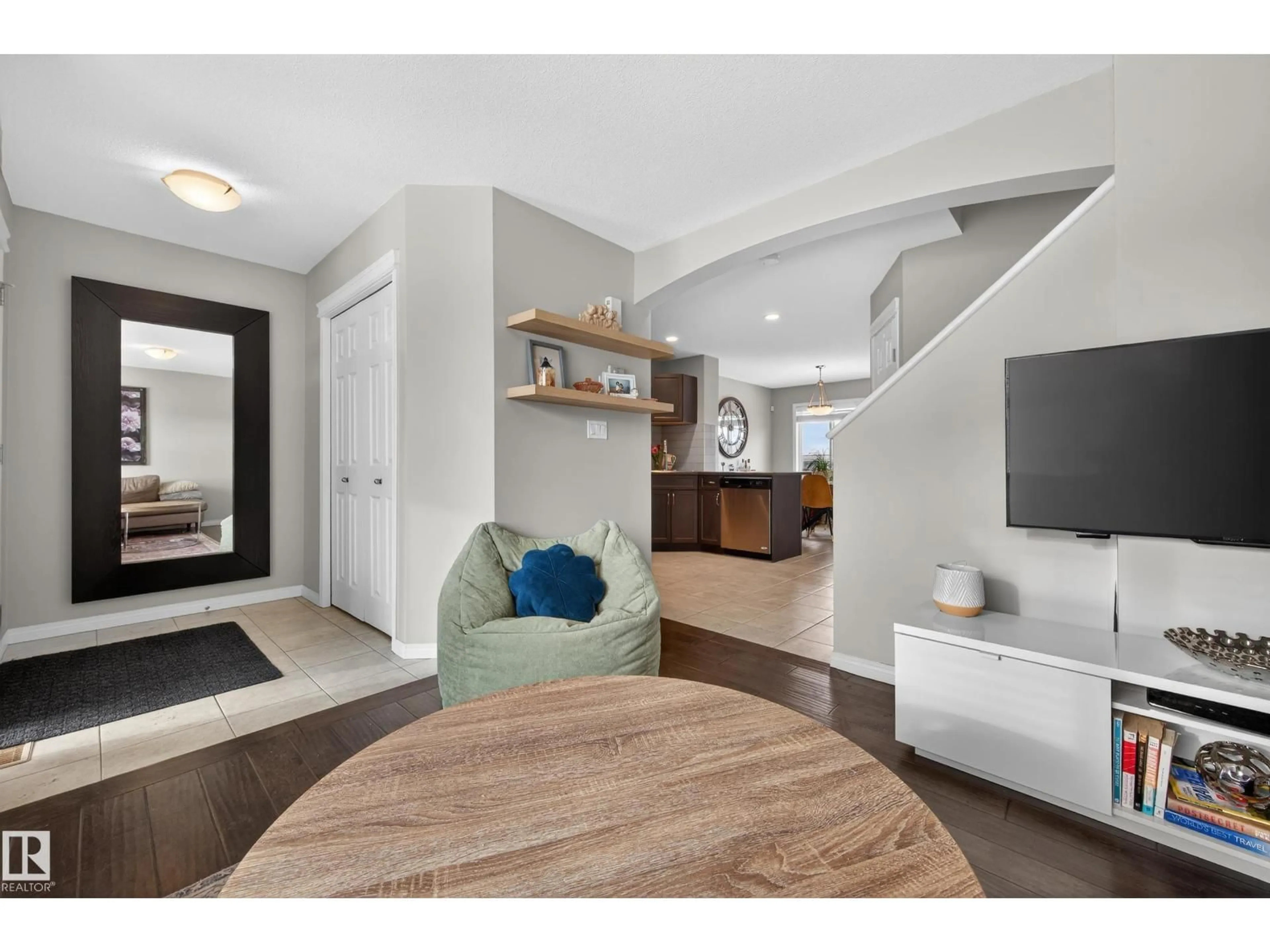 Living room with furniture, unknown for 5256 21 AV, Edmonton Alberta T6X1X3