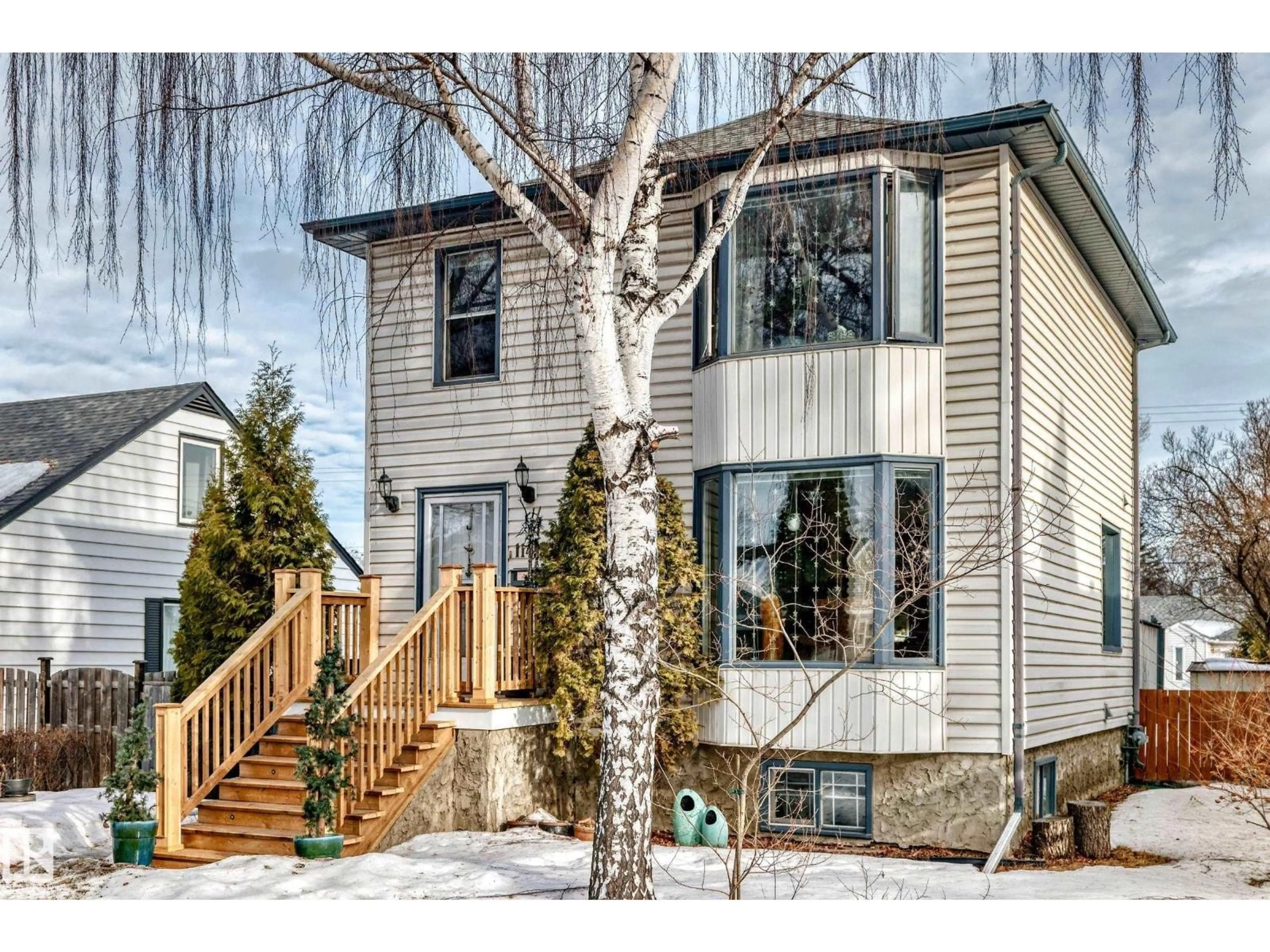 Home with vinyl exterior material, street for 11415 71 ST, Edmonton Alberta T5B1V8