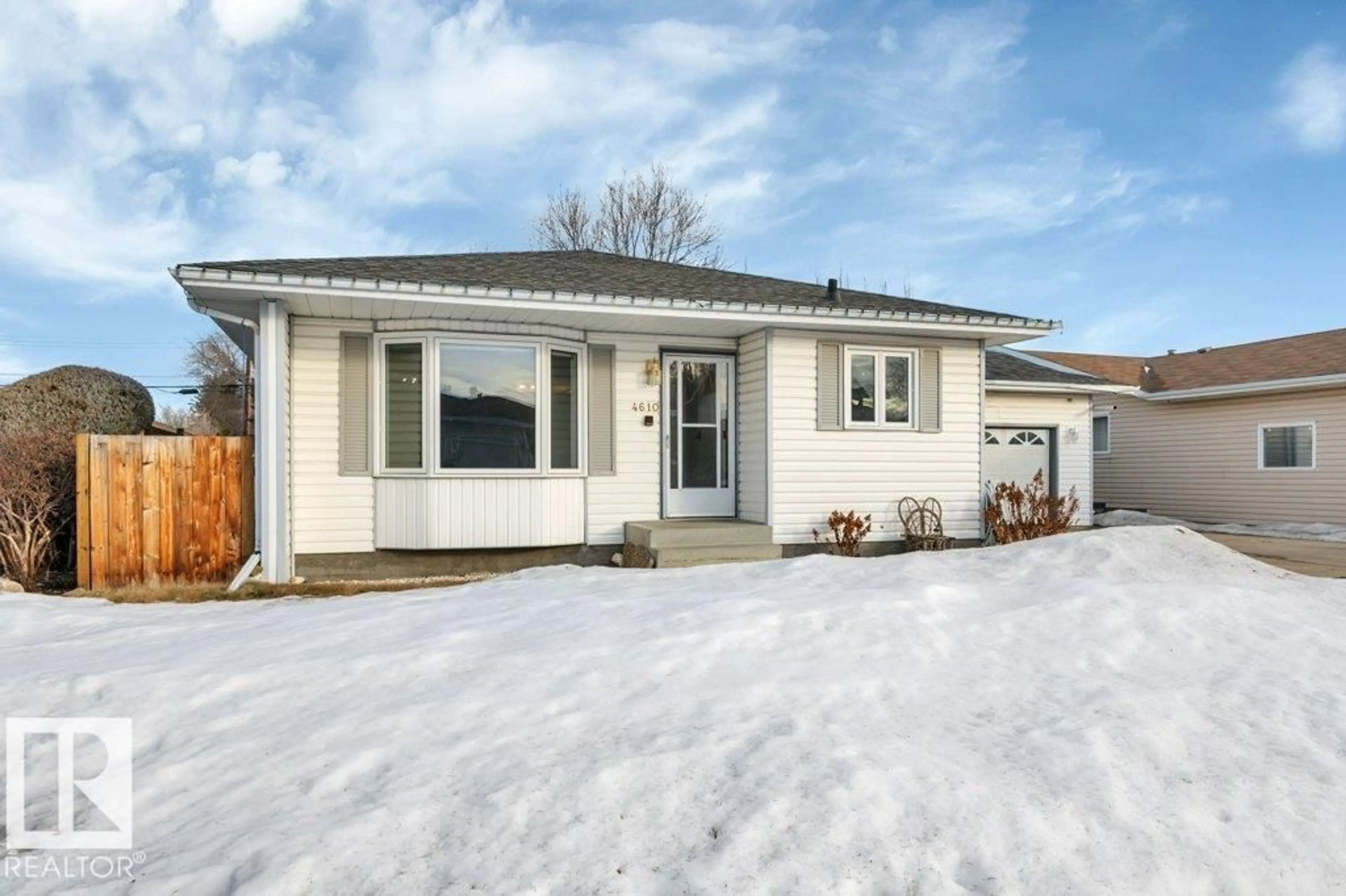 Home with vinyl exterior material, street for 4610 46 AV, Wetaskiwin Alberta T9A0H2