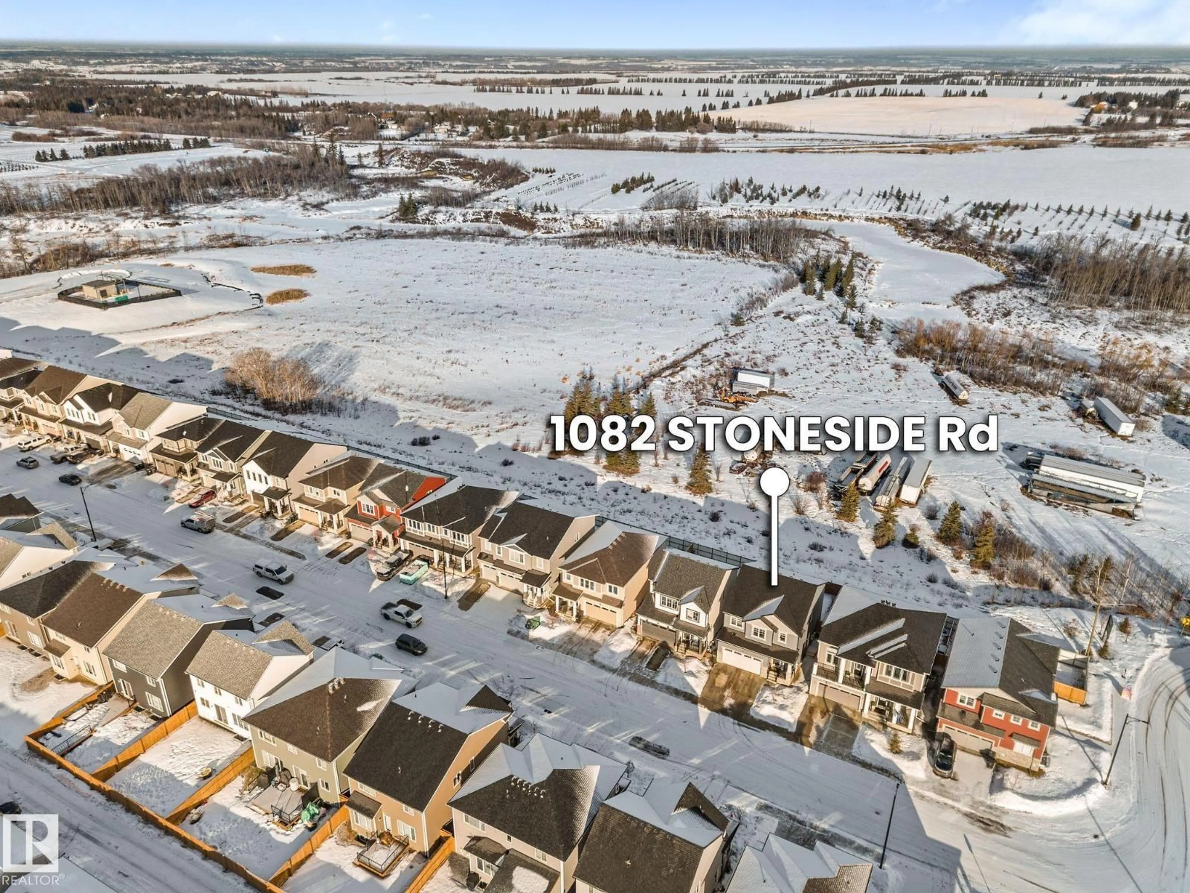 A pic from outside/outdoor area/front of a property/back of a property/a pic from drone, water/lake/river/ocean view for 1082 STONESIDE RD, Sherwood Park Alberta T8H3A1