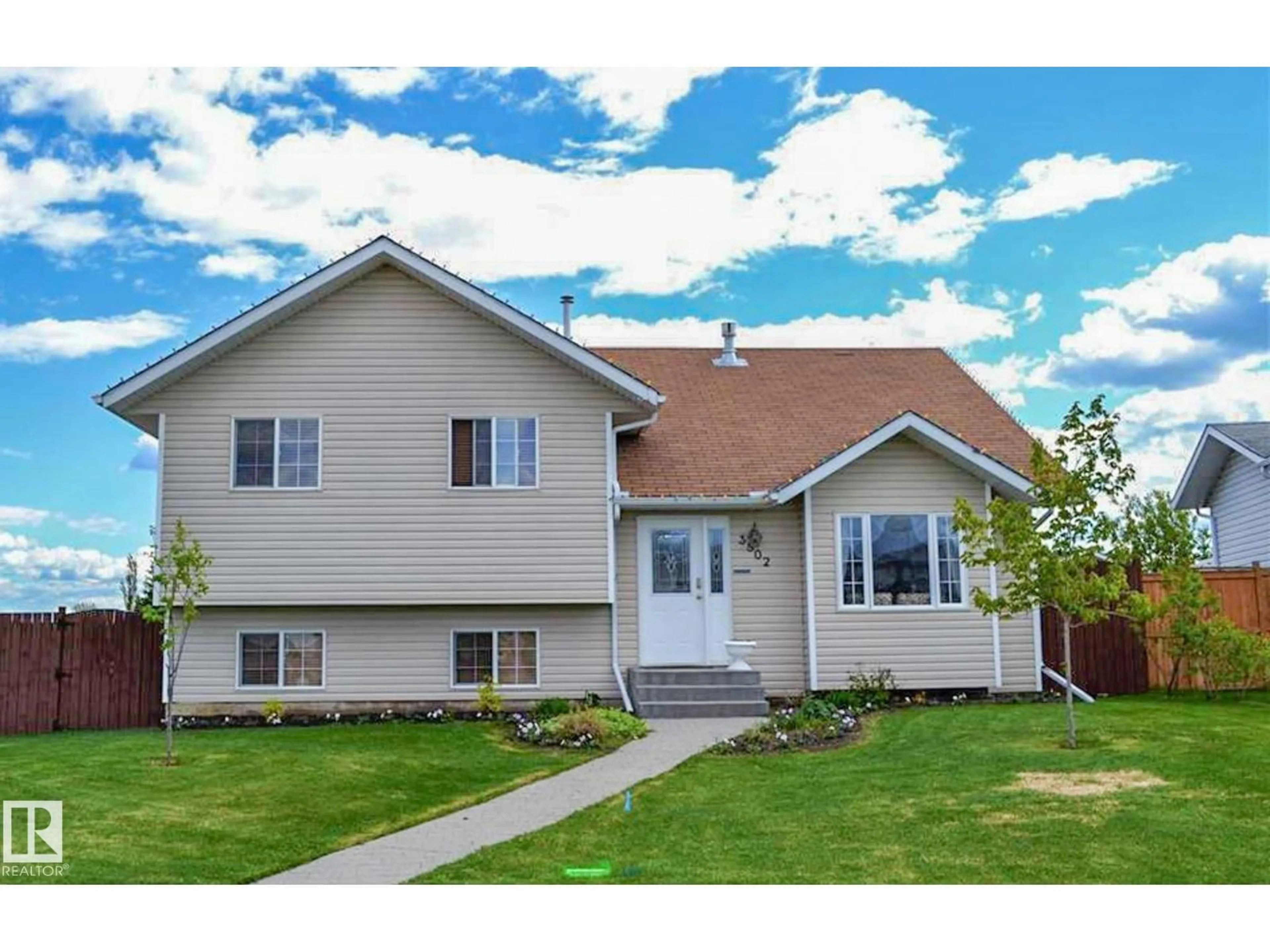 Home with vinyl exterior material, street for 3802 42 AV, Bonnyville Town Alberta T9N2J9