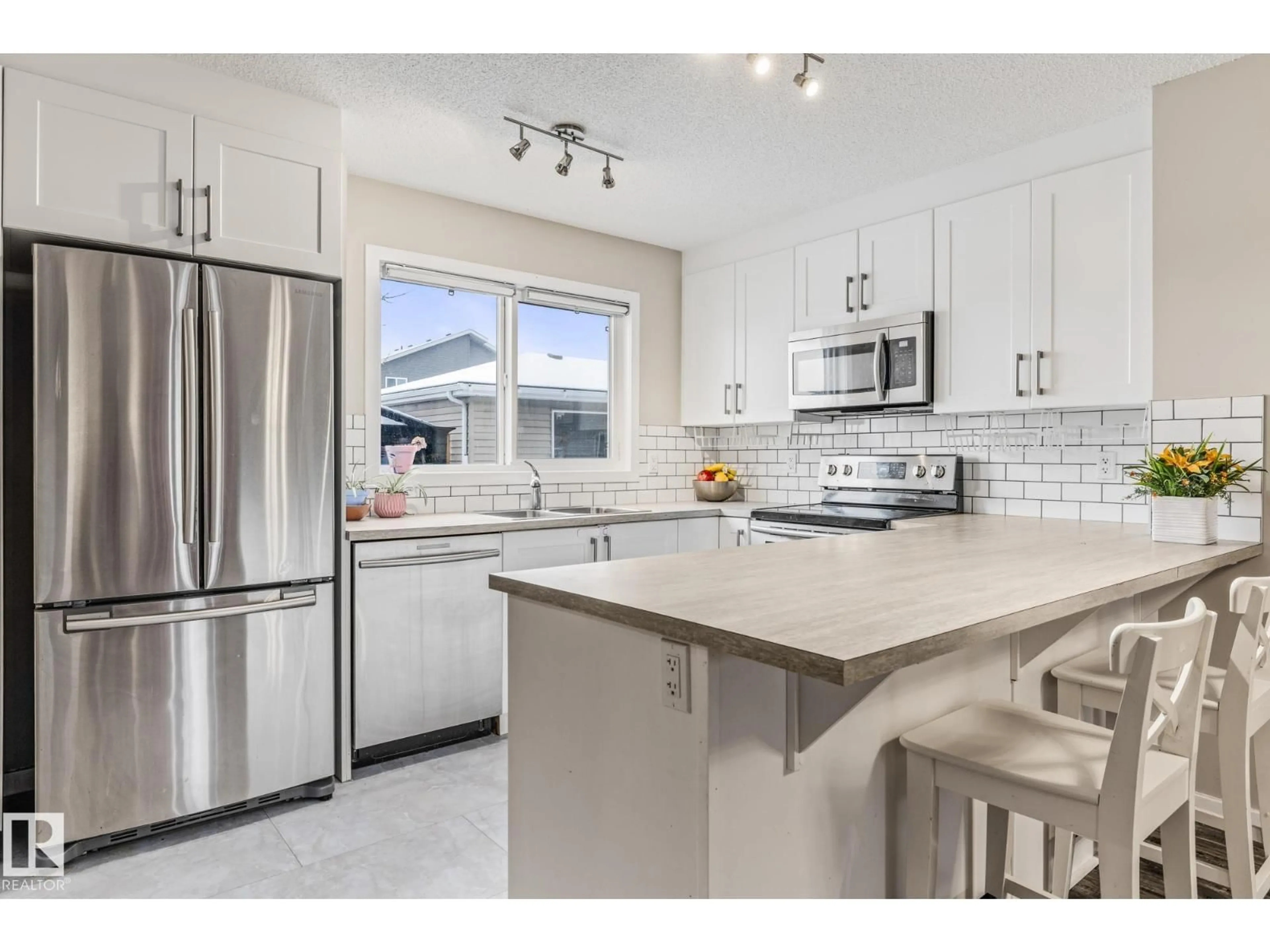 Open concept kitchen, ceramic/tile floor for 384 CHARLESWORTH DR, Edmonton Alberta T6X2G5