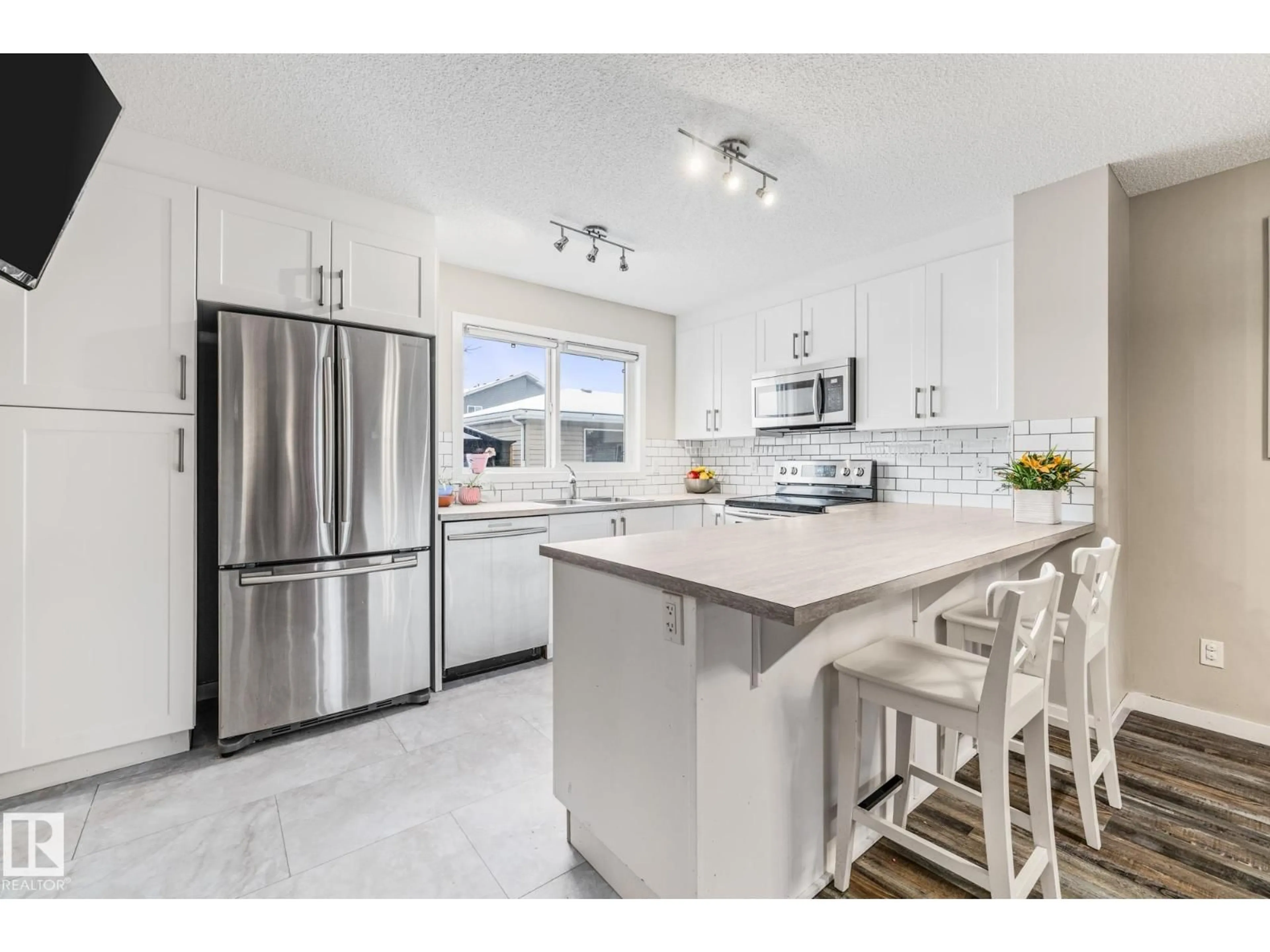 Open concept kitchen, ceramic/tile floor for 384 CHARLESWORTH DR, Edmonton Alberta T6X2G5