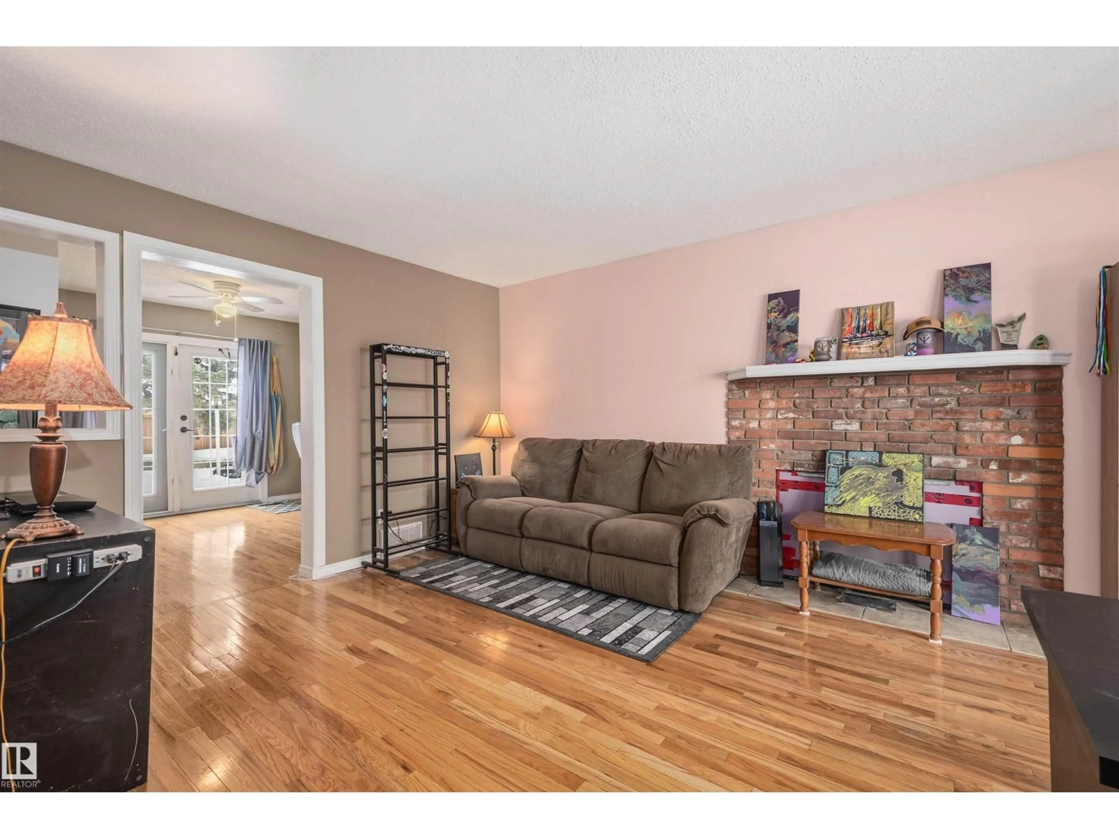 Living room with furniture, wood/laminate floor for 50 WESTGLEN CR, Spruce Grove Alberta T7X1V9