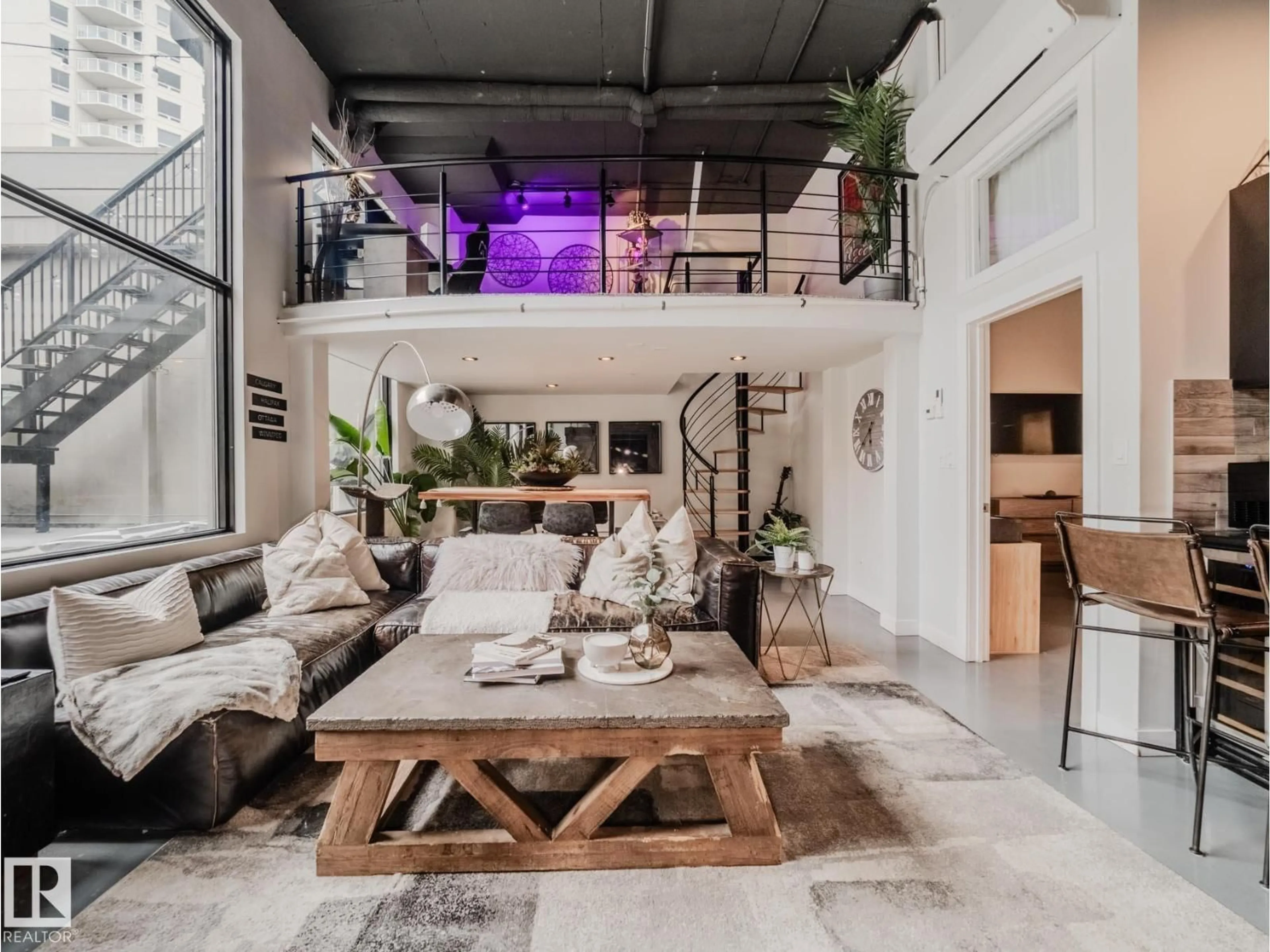 Living room with furniture, cement floor for 1001 10179 105 ST NW, Edmonton Alberta T5J3N1