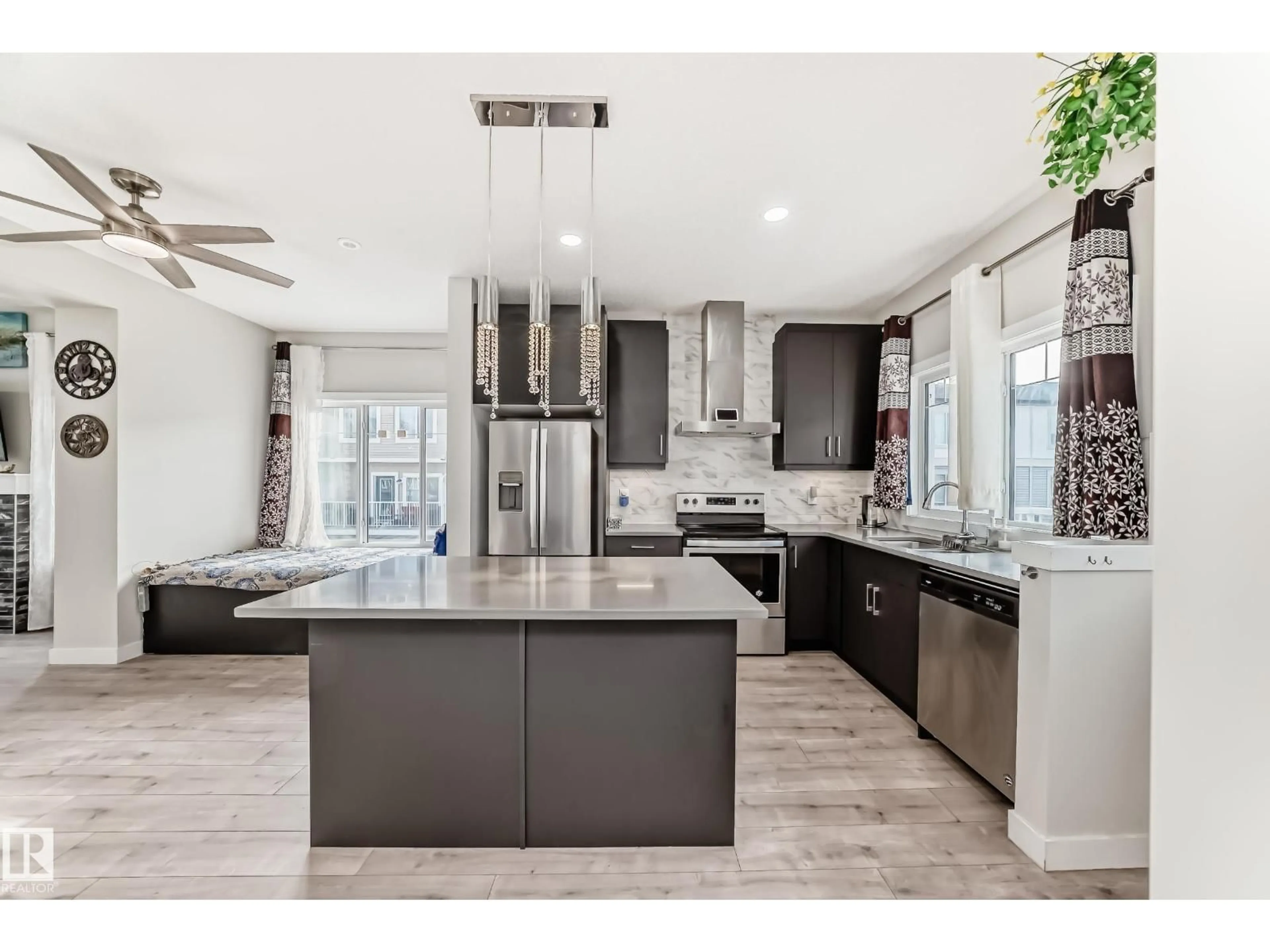 Open concept kitchen, ceramic/tile floor for 55 2215 24 ST NW, Edmonton Alberta T6T1A6