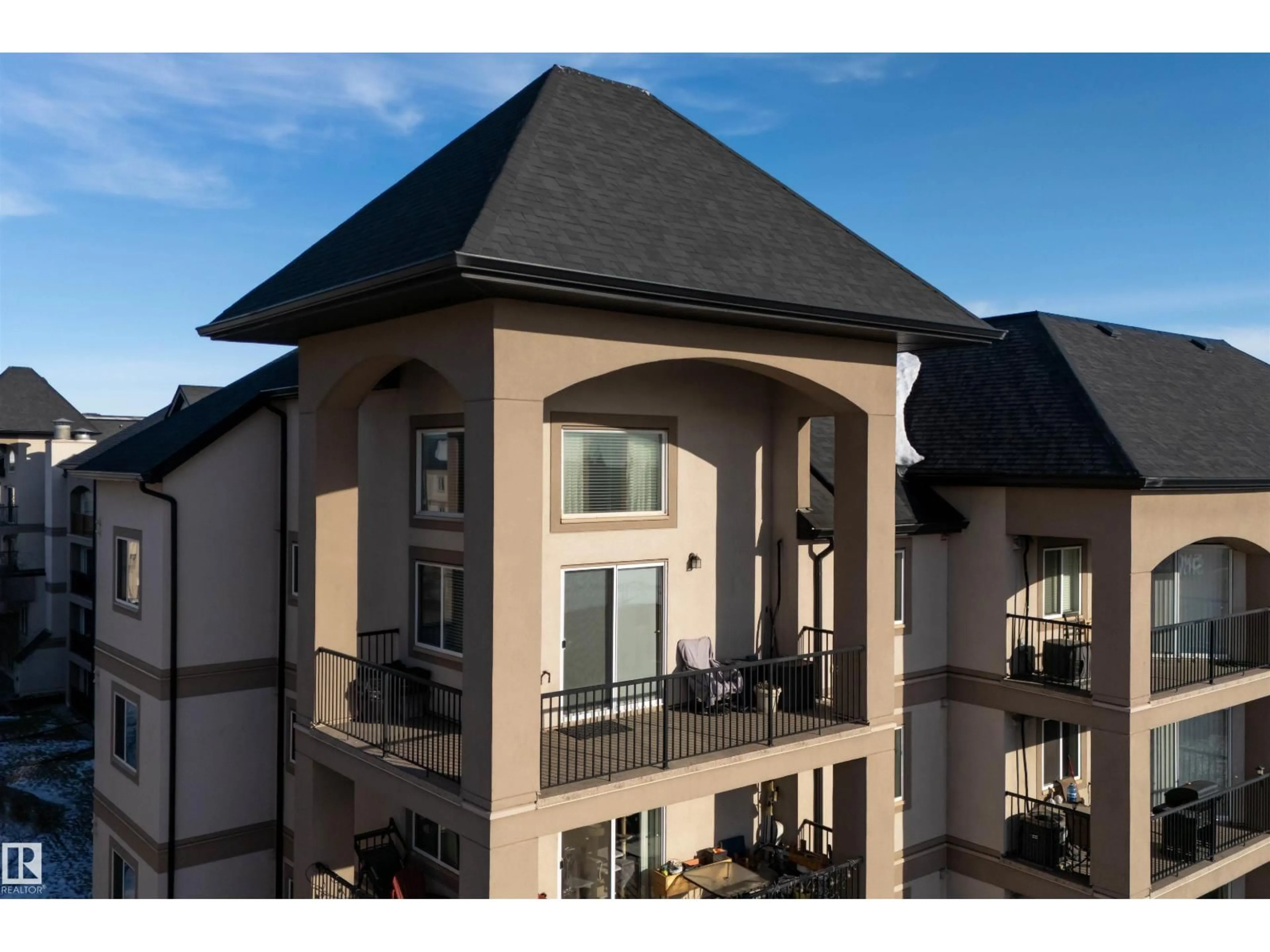 A pic from outside/outdoor area/front of a property/back of a property/a pic from drone, building for 427 13005 140 AV NW, Edmonton Alberta T6V1X1