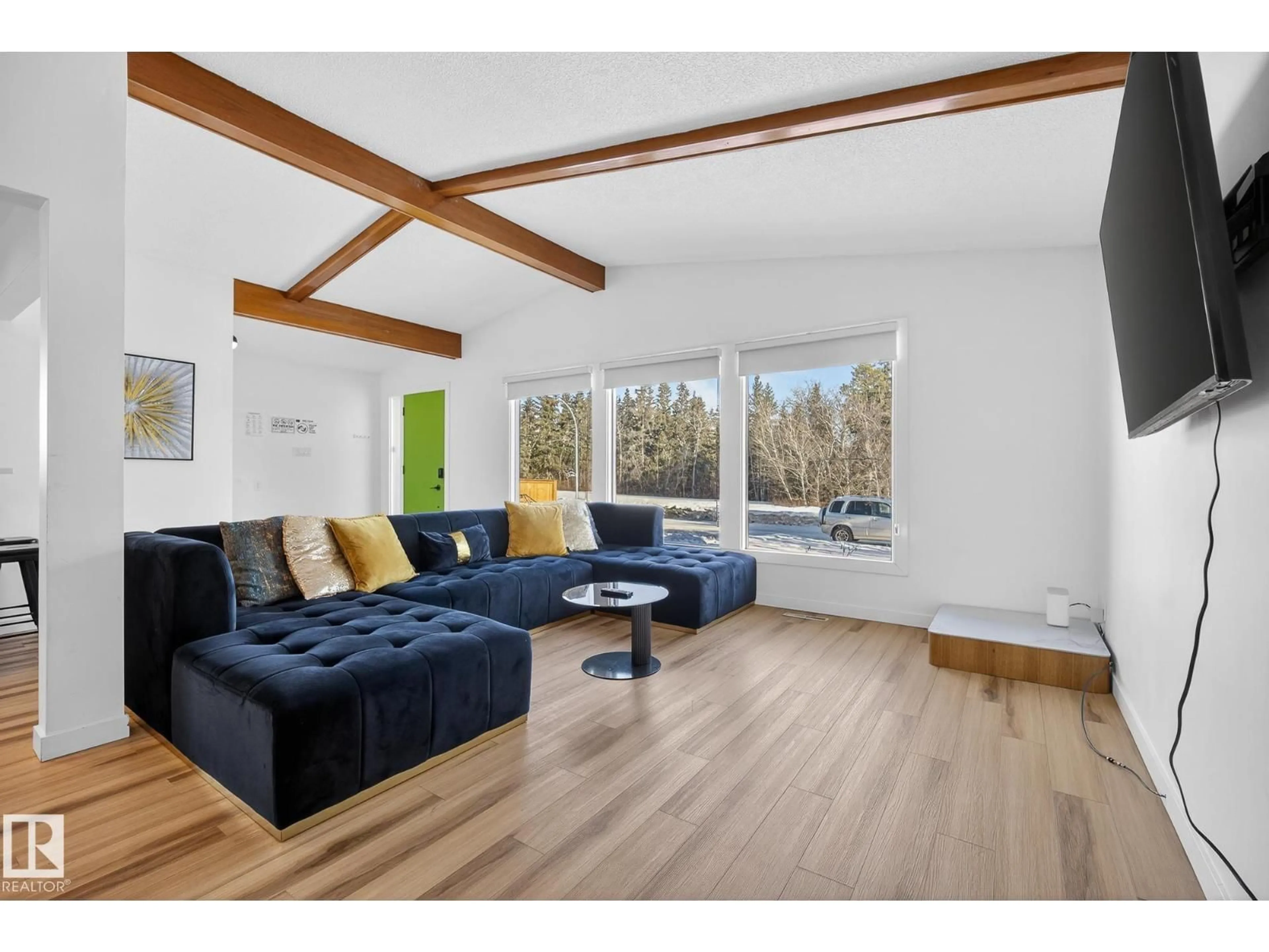 Living room with furniture, wood/laminate floor for NW - 9616 64 ST, Edmonton Alberta T6B1R2