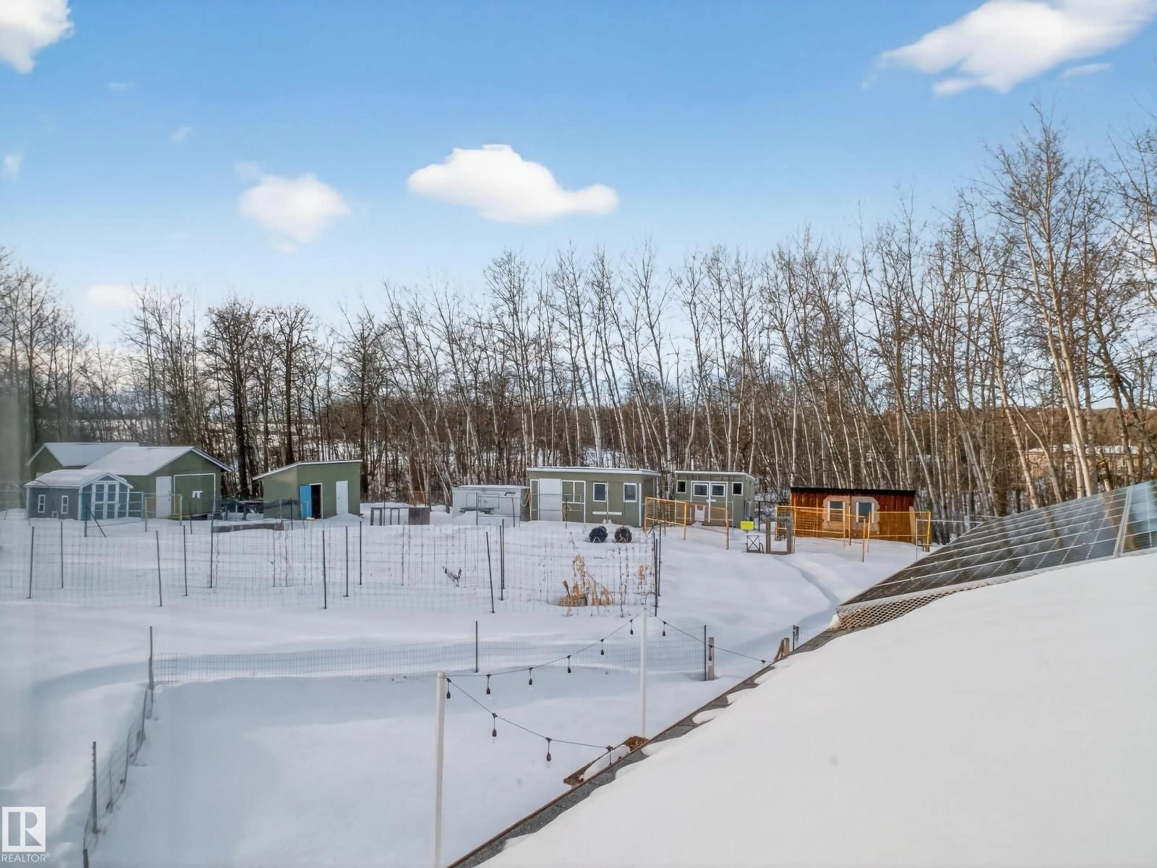 A pic from outside/outdoor area/front of a property/back of a property/a pic from drone, mountain view for 57018 RGE ROAD 233, Rural Sturgeon County Alberta T0A1N5