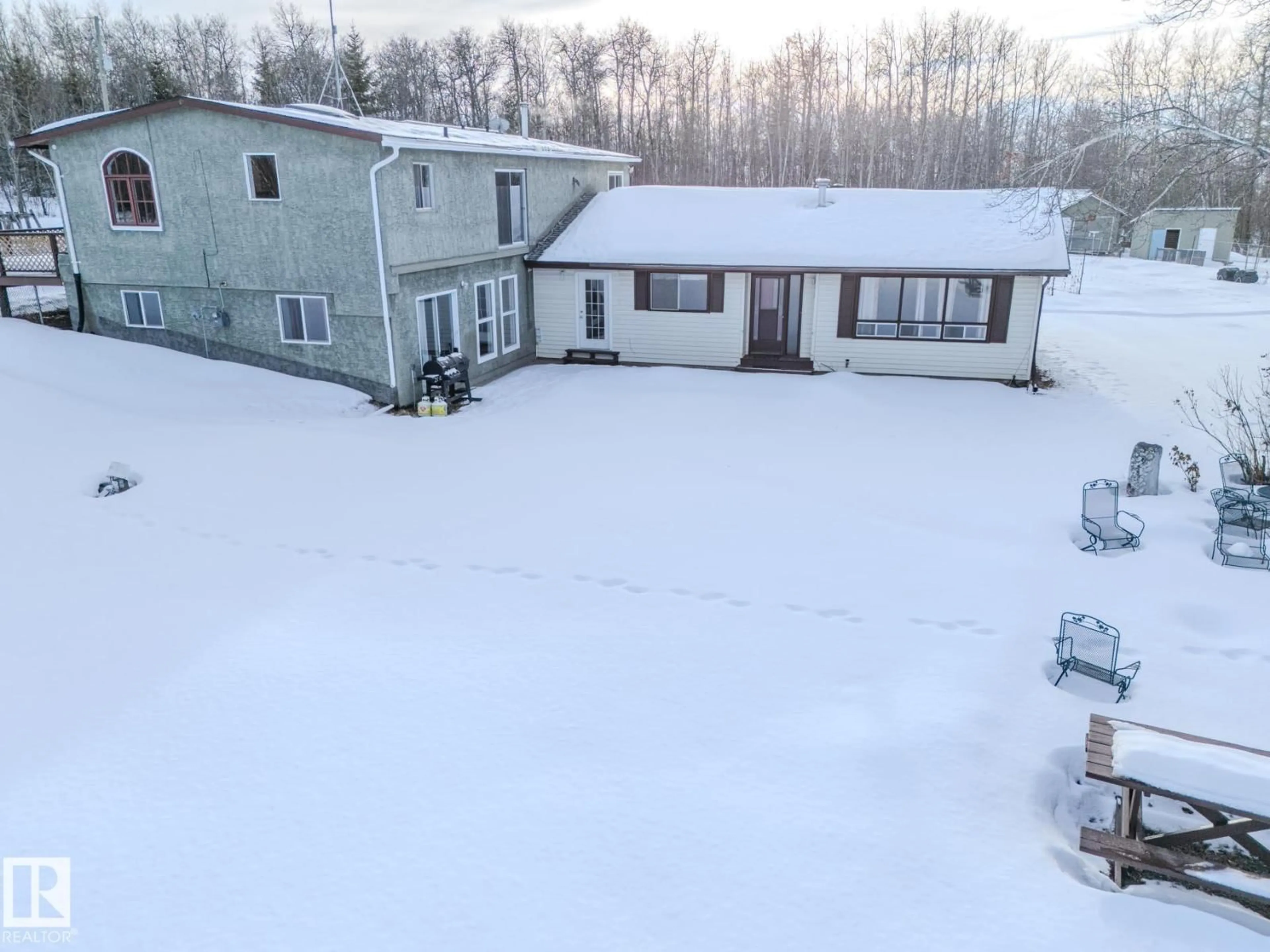 A pic from outside/outdoor area/front of a property/back of a property/a pic from drone, unknown for 57018 RGE ROAD 233, Rural Sturgeon County Alberta T0A1N5