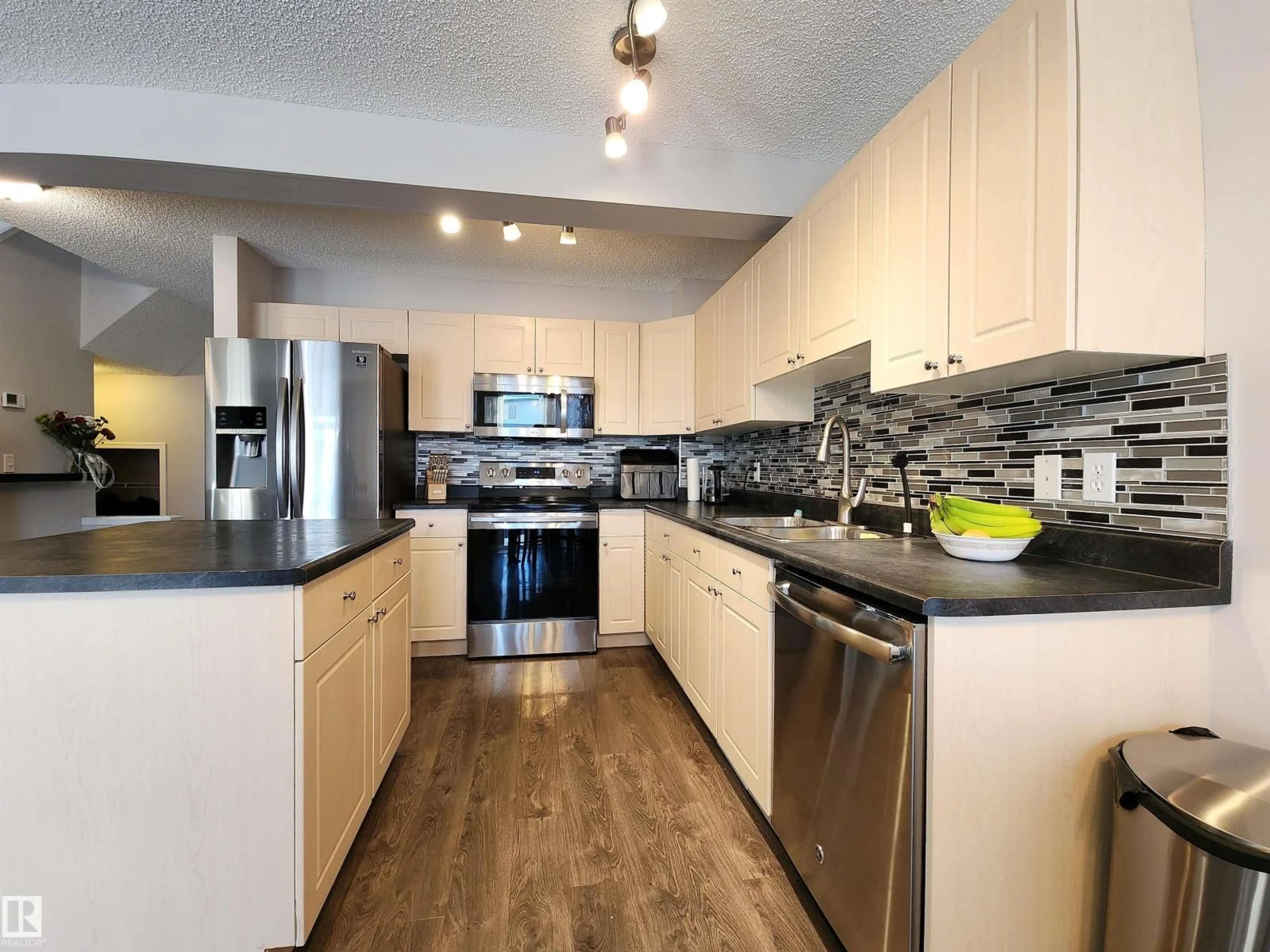 Open concept kitchen, unknown for NW - 5424 204 ST, Edmonton Alberta T6M2Z1