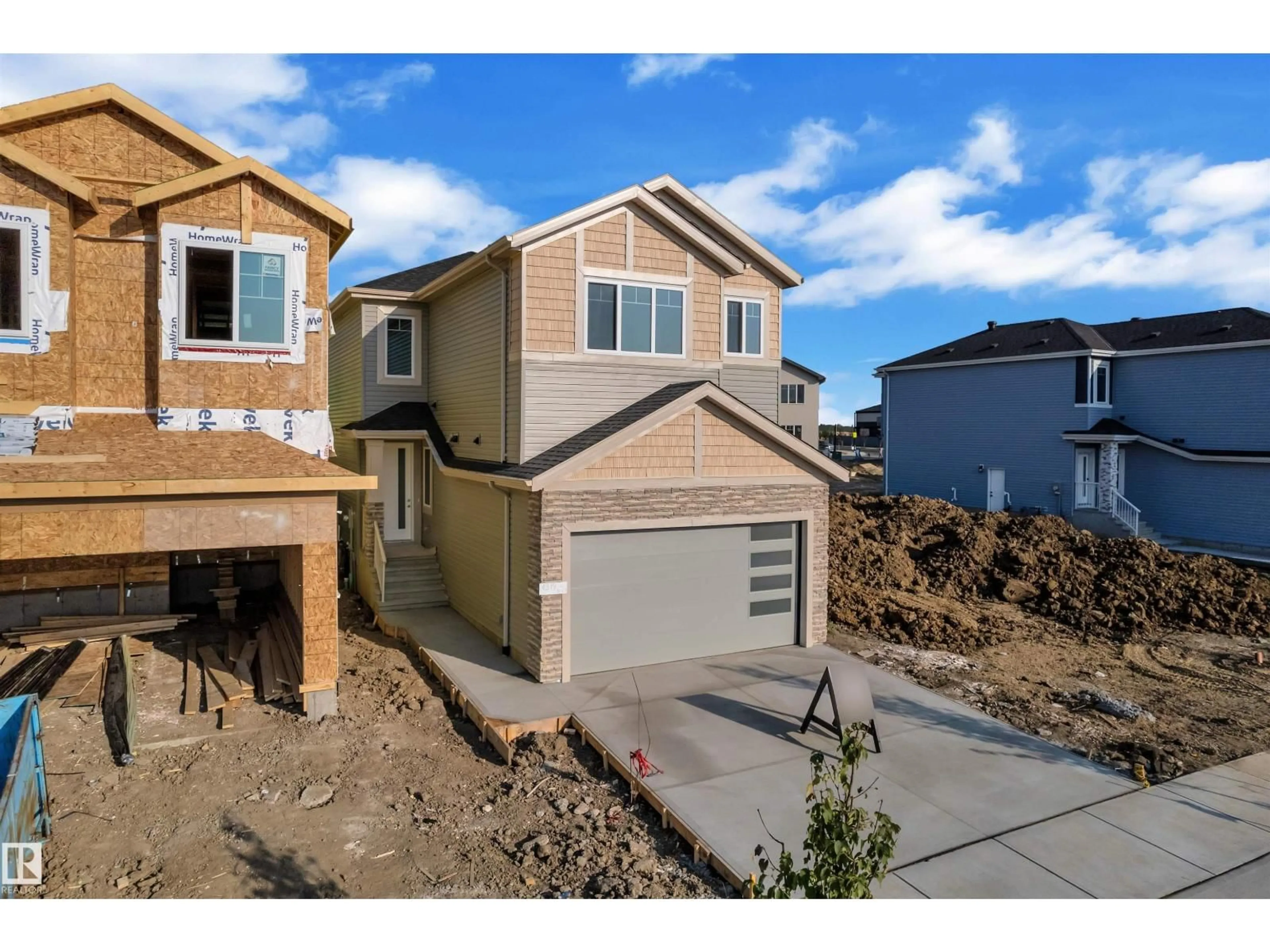 Home with vinyl exterior material, street for 4312 36 ST, Beaumont Alberta T4X3G8