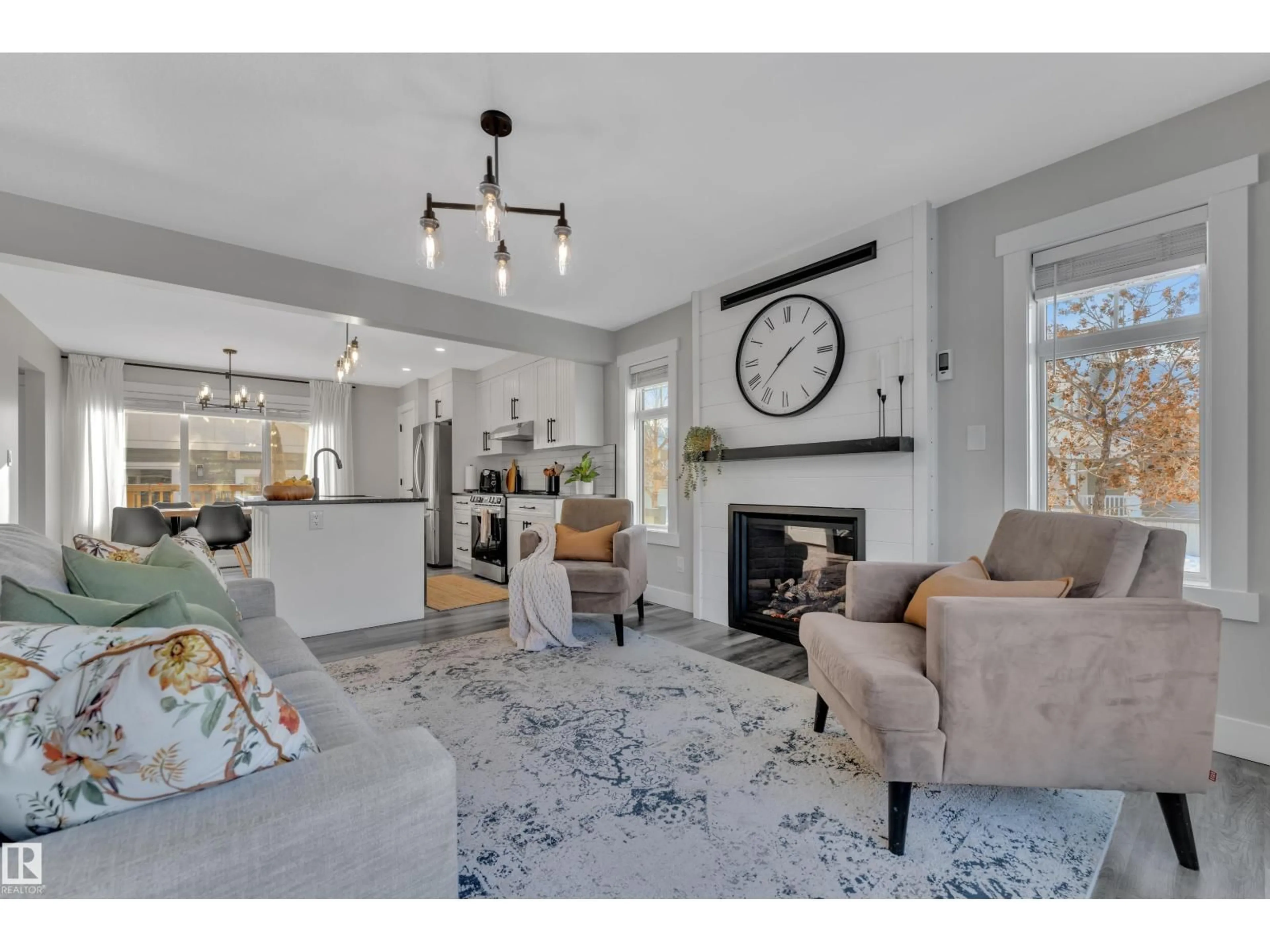 Living room with furniture, unknown for SW - 7613 16 AV, Edmonton Alberta T6X1M3