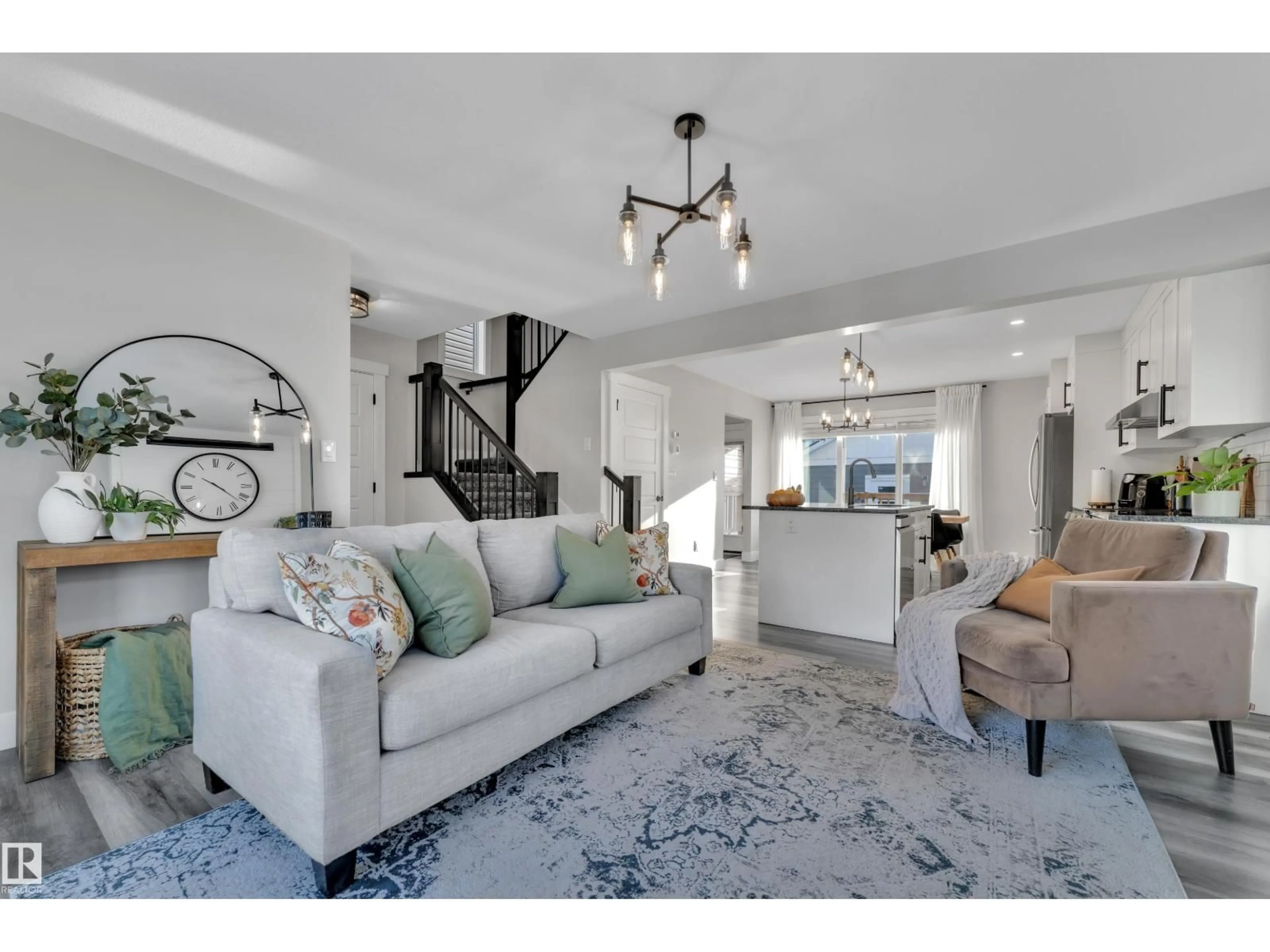 Living room with furniture, unknown for SW - 7613 16 AV, Edmonton Alberta T6X1M3