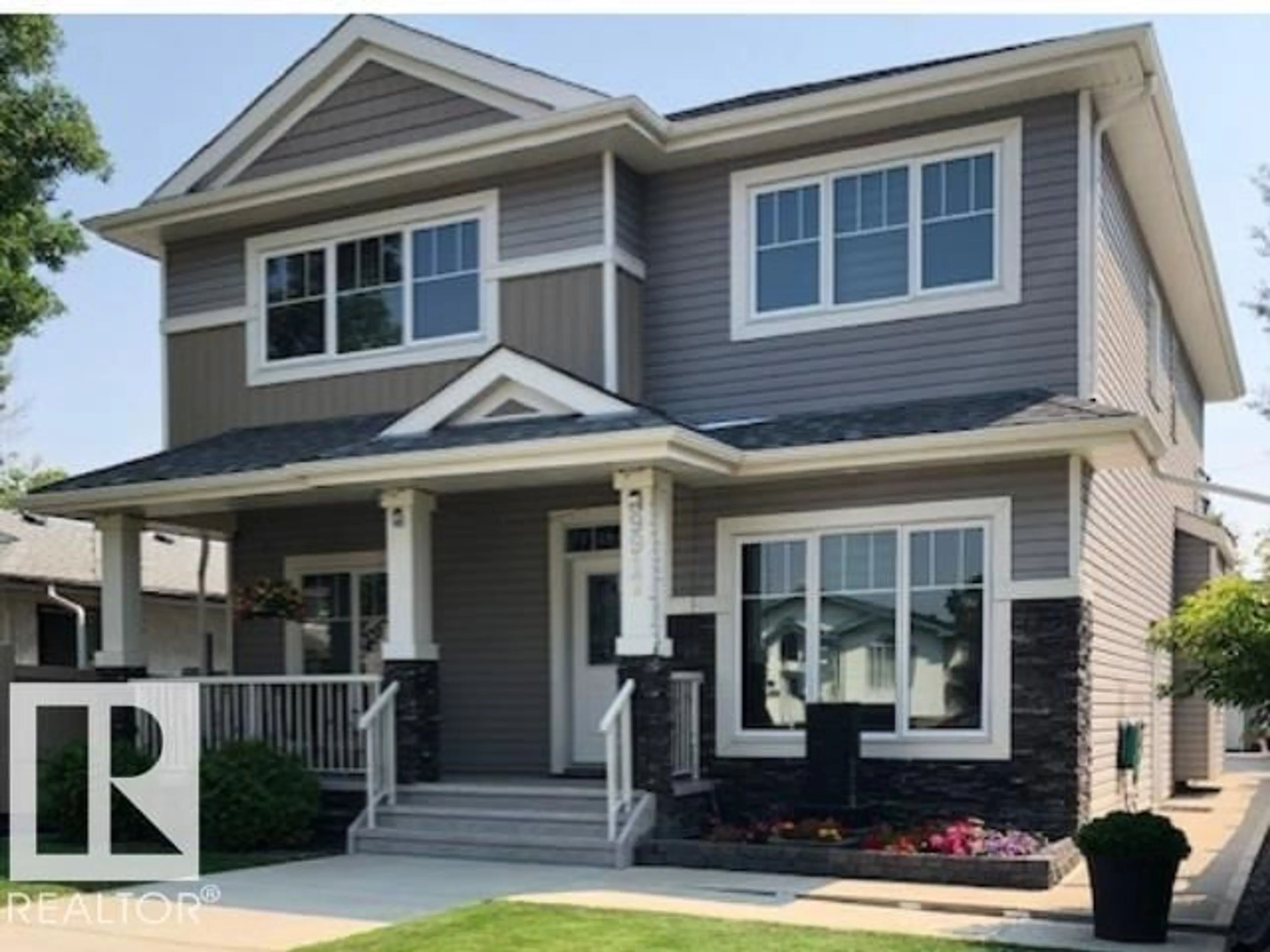 Home with vinyl exterior material, street for NW - 9917 162 ST, Edmonton Alberta T5P3L3