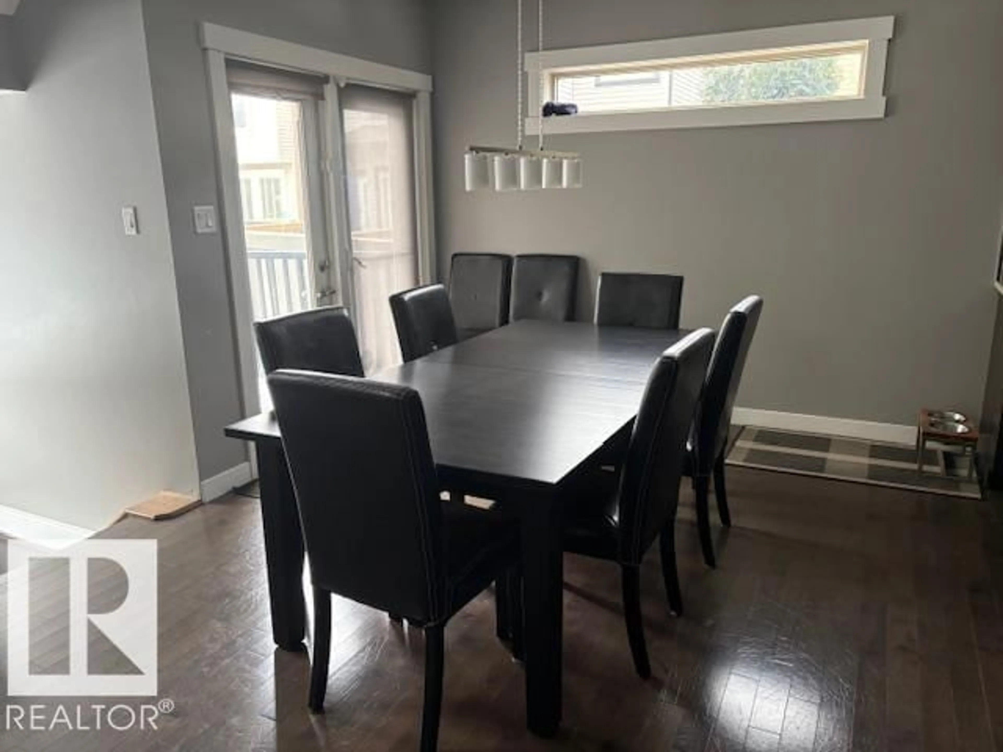 Dining room, wood/laminate floor for 867 ARMITAGE WYND, Edmonton Alberta T6W0K4