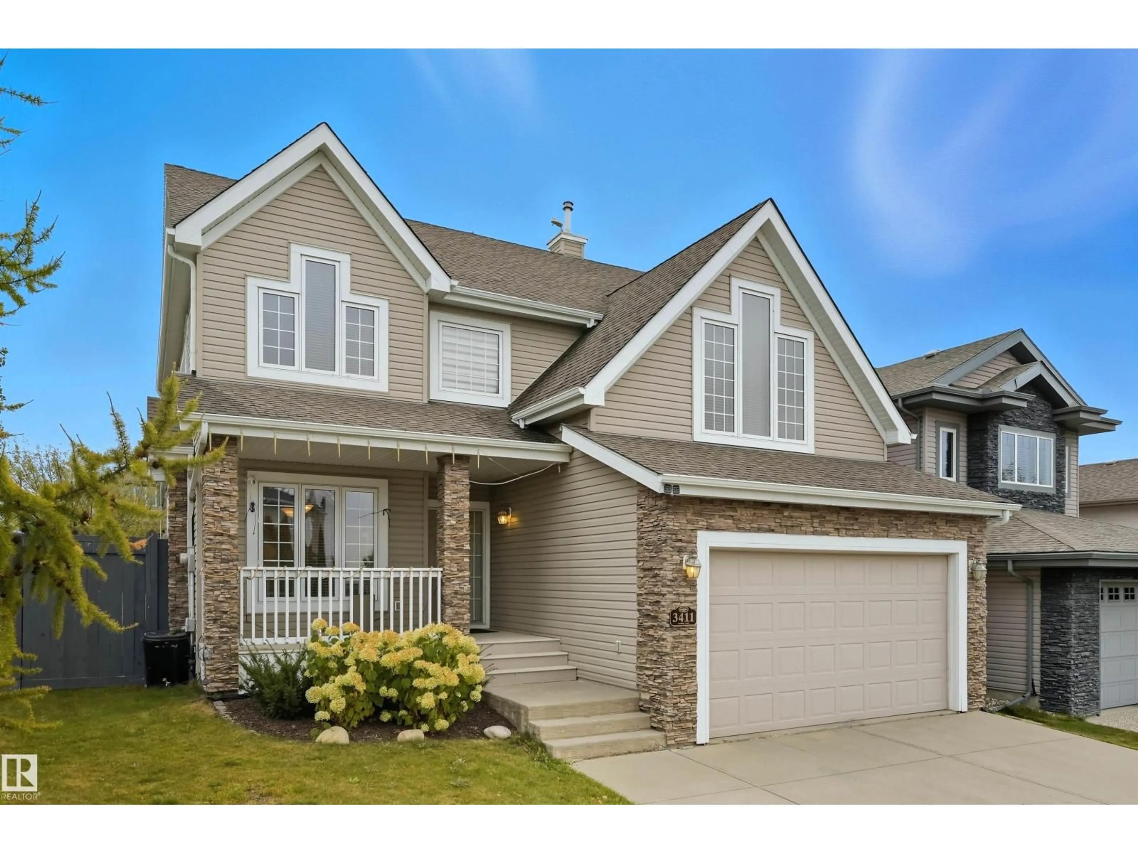 Home with vinyl exterior material, street for 3411 MACNEIL LI, Edmonton Alberta T6R0H5