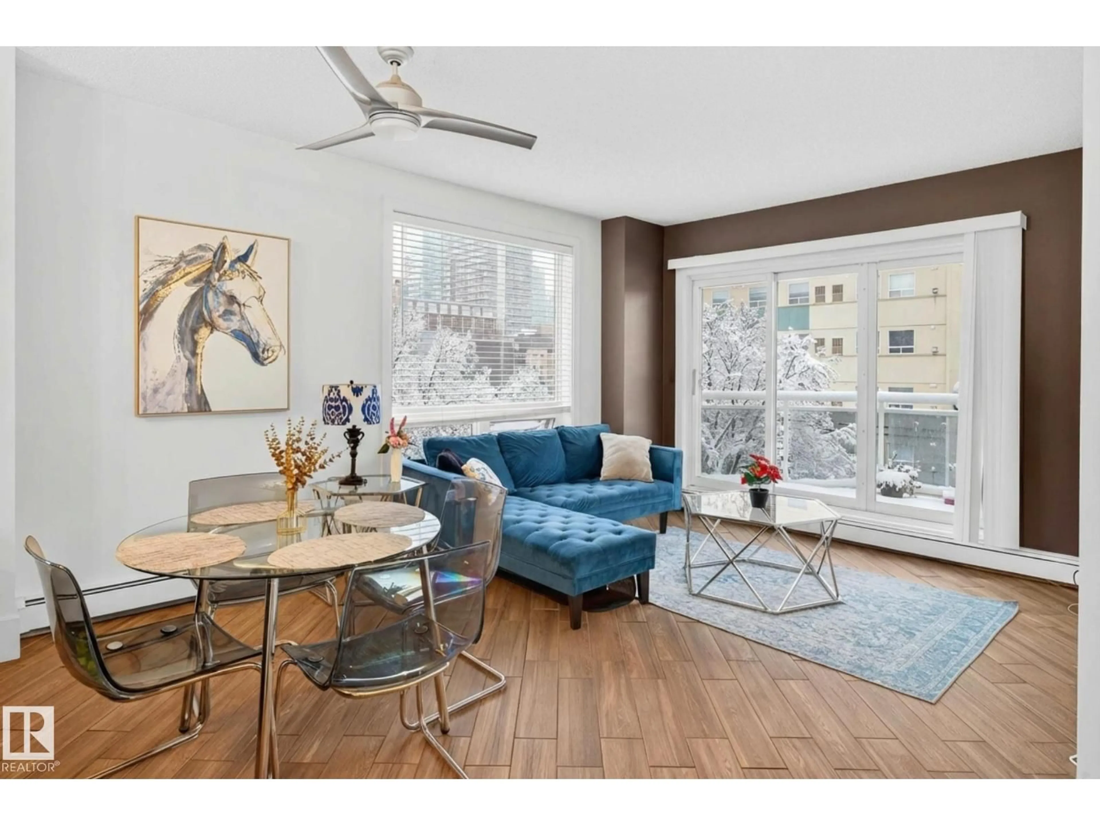 Living room with furniture, wood/laminate floor for #401 - 10504 99 AV, Edmonton Alberta T5K1B2