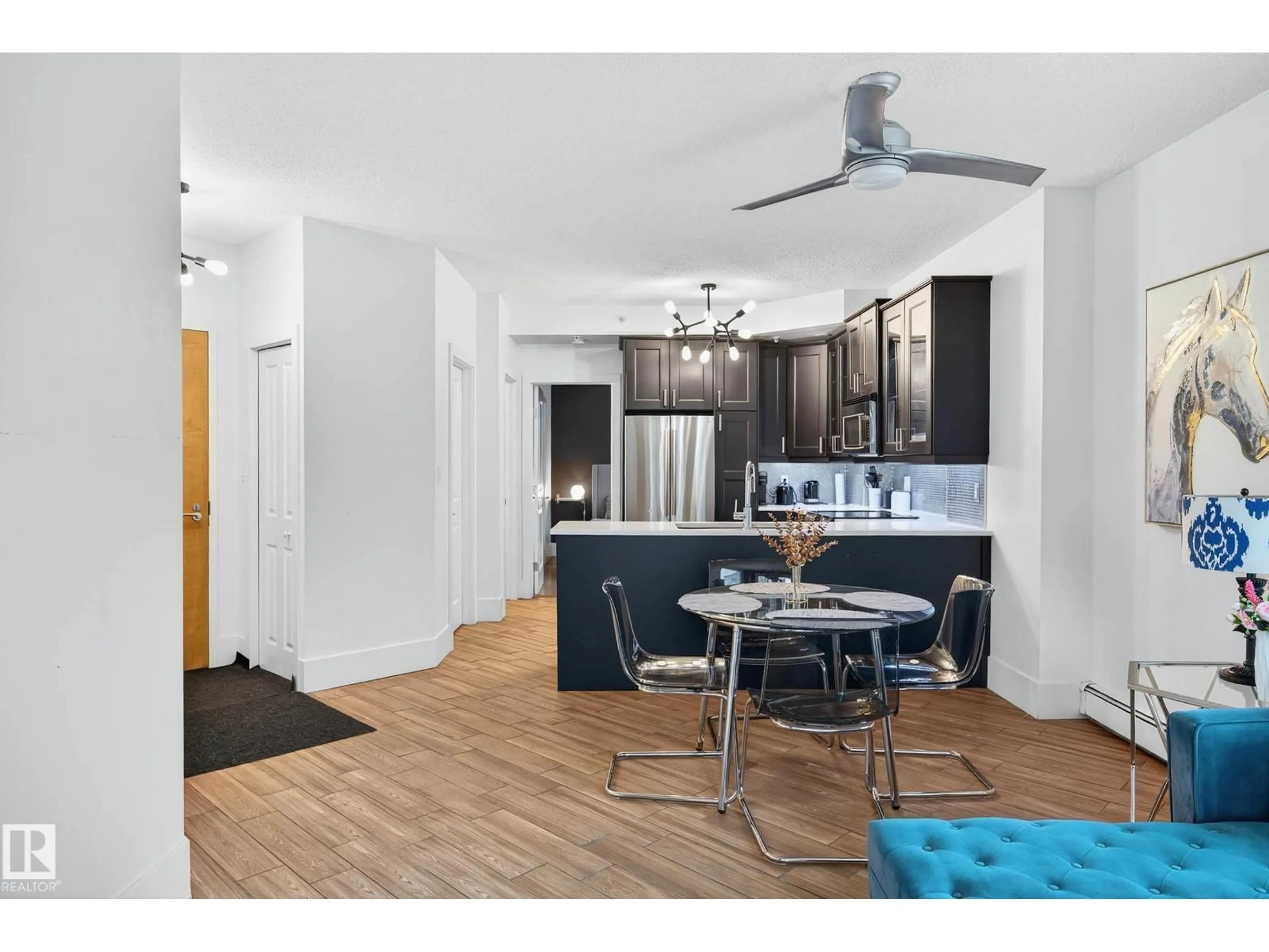 Open concept kitchen, wood/laminate floor for #401 - 10504 99 AV, Edmonton Alberta T5K1B2