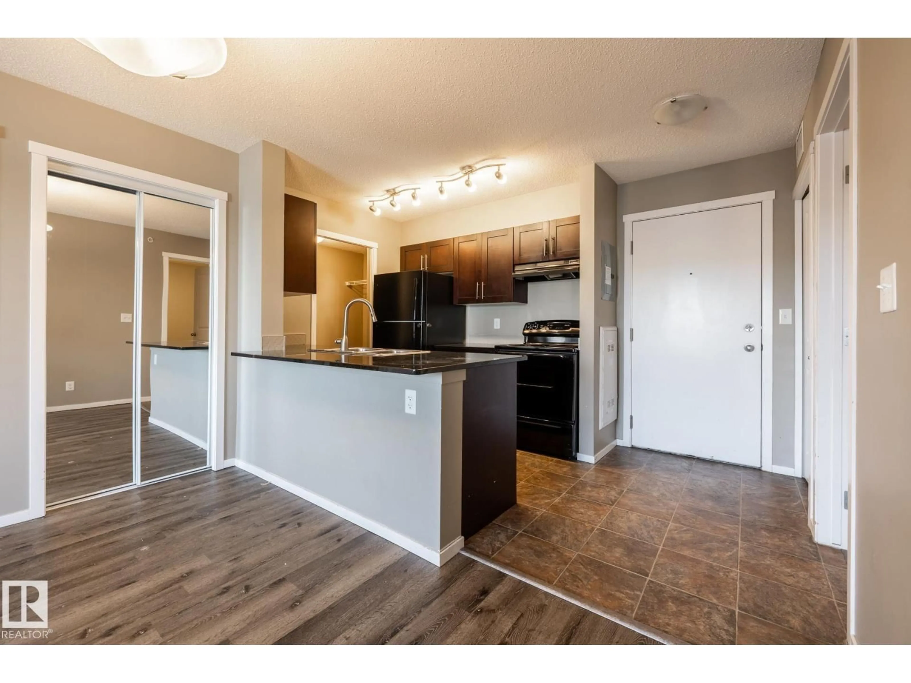 Open concept kitchen, unknown for 433 - 3315 JAMES MOWATT TR, Edmonton Alberta T6W3L9