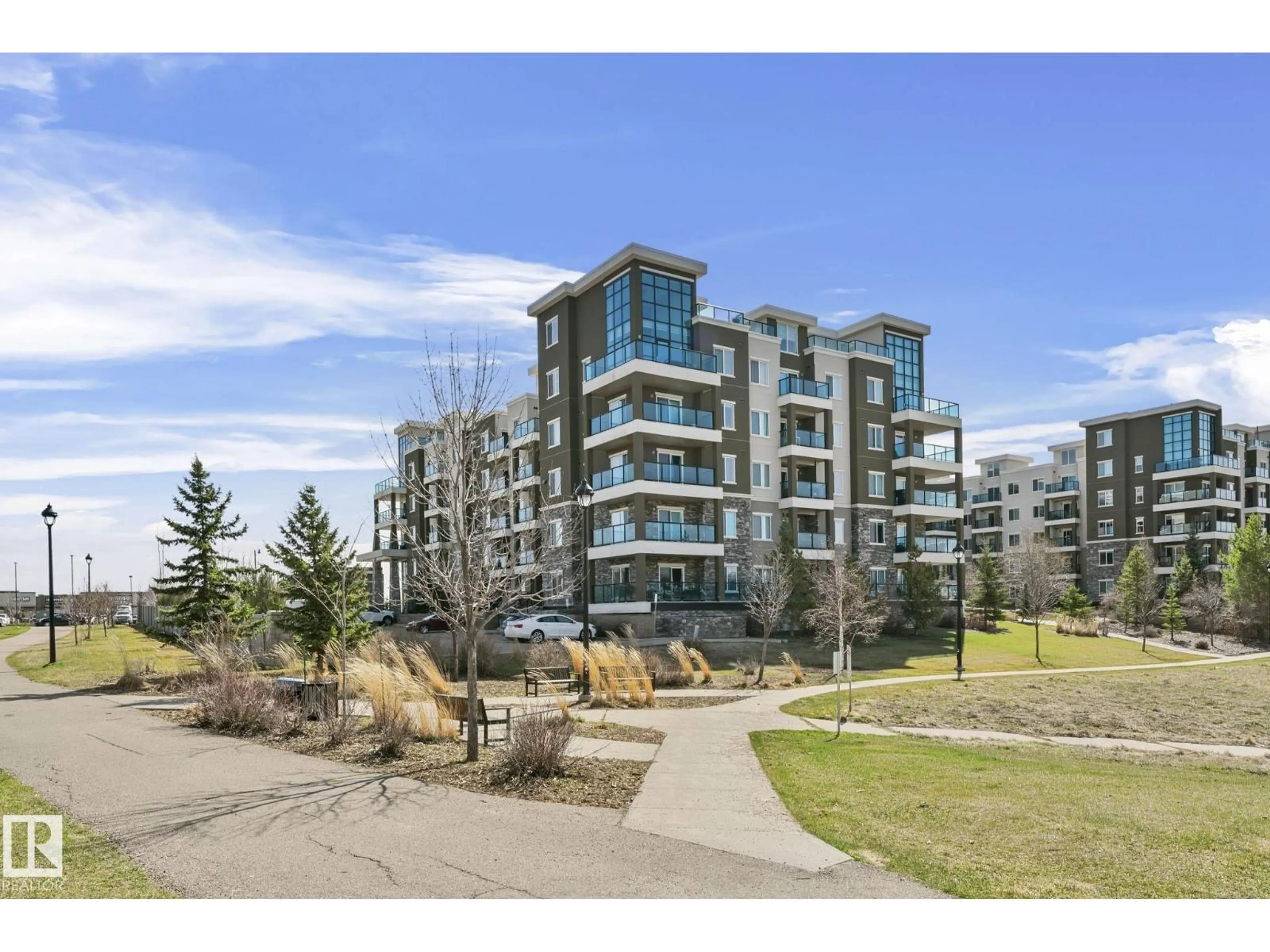 A pic from outside/outdoor area/front of a property/back of a property/a pic from drone, unknown for #114 - 1230 WINDERMERE WY, Edmonton Alberta T6W2J3