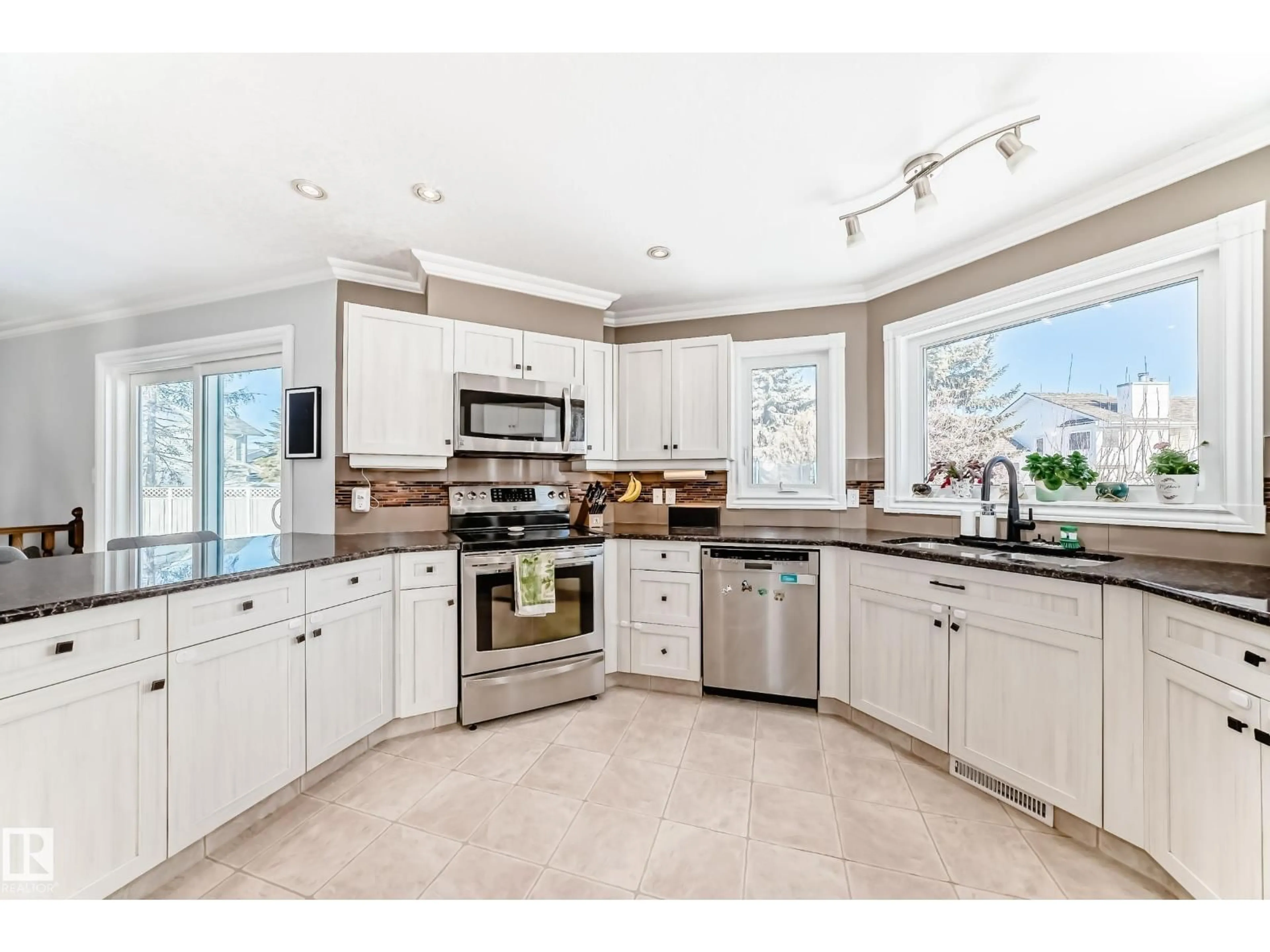 Open concept kitchen, ceramic/tile floor for 12924 157 AV, Edmonton Alberta T6V1A4