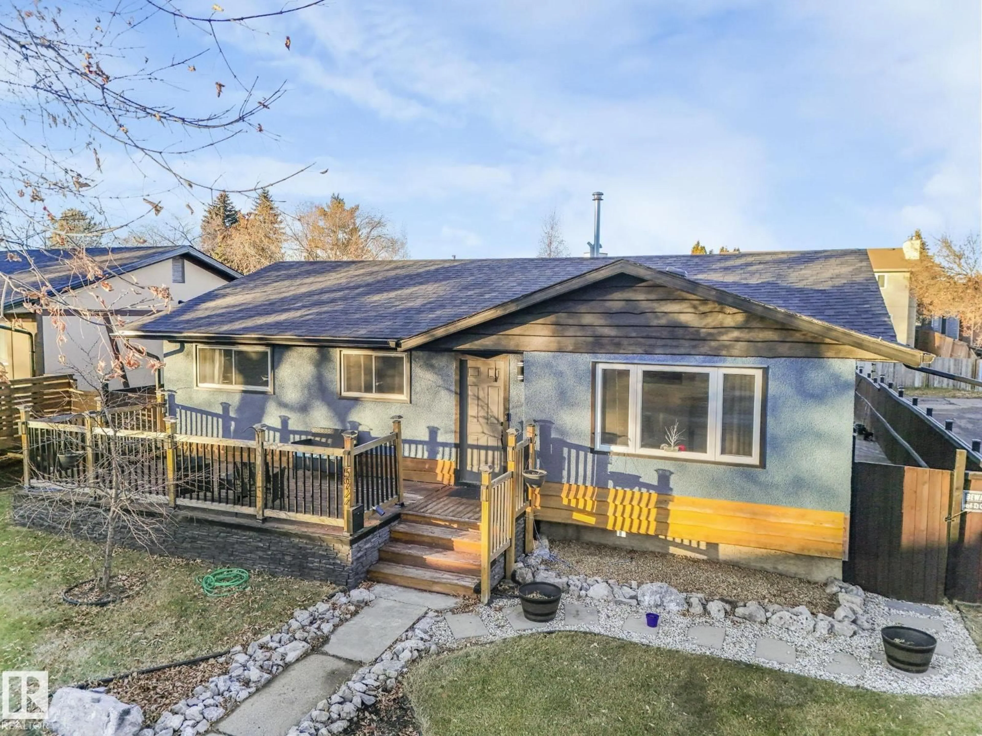 Home with vinyl exterior material, street for 5924 152A AV, Edmonton Alberta T5A1X7