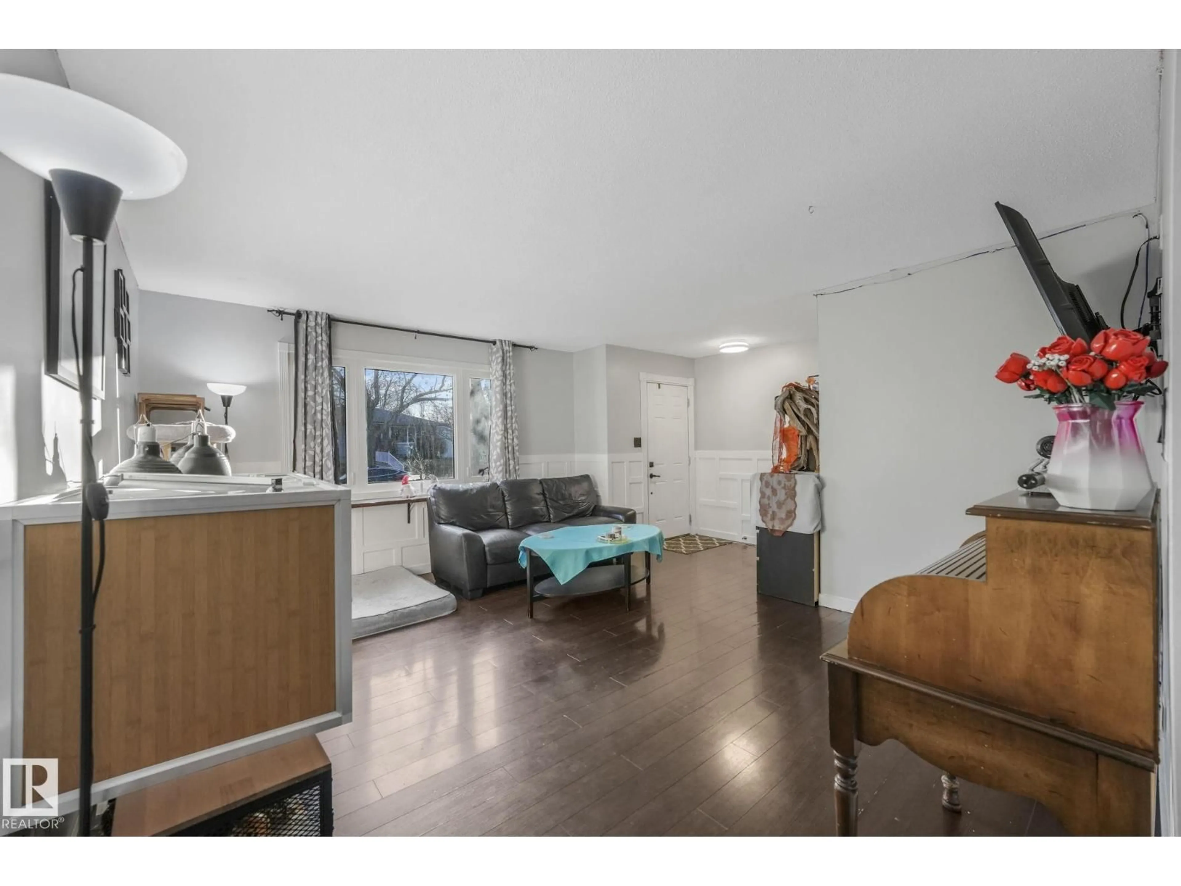 Living room with furniture, unknown for 5924 152A AV, Edmonton Alberta T5A1X7