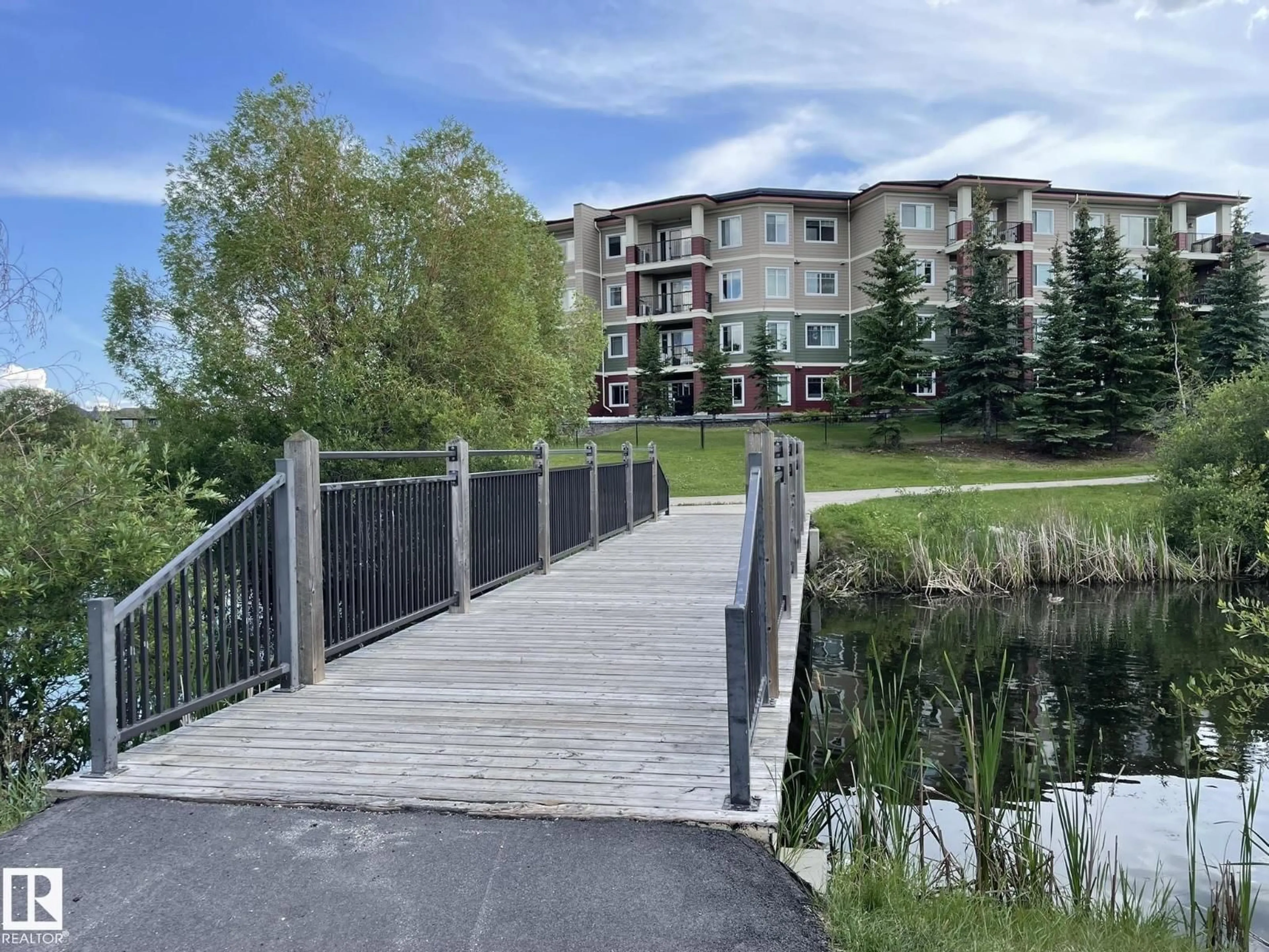 A pic from outside/outdoor area/front of a property/back of a property/a pic from drone, water/lake/river/ocean view for 207 - 7021 SOUTH TERWILLEGAR DR, Edmonton Alberta T6R0W5
