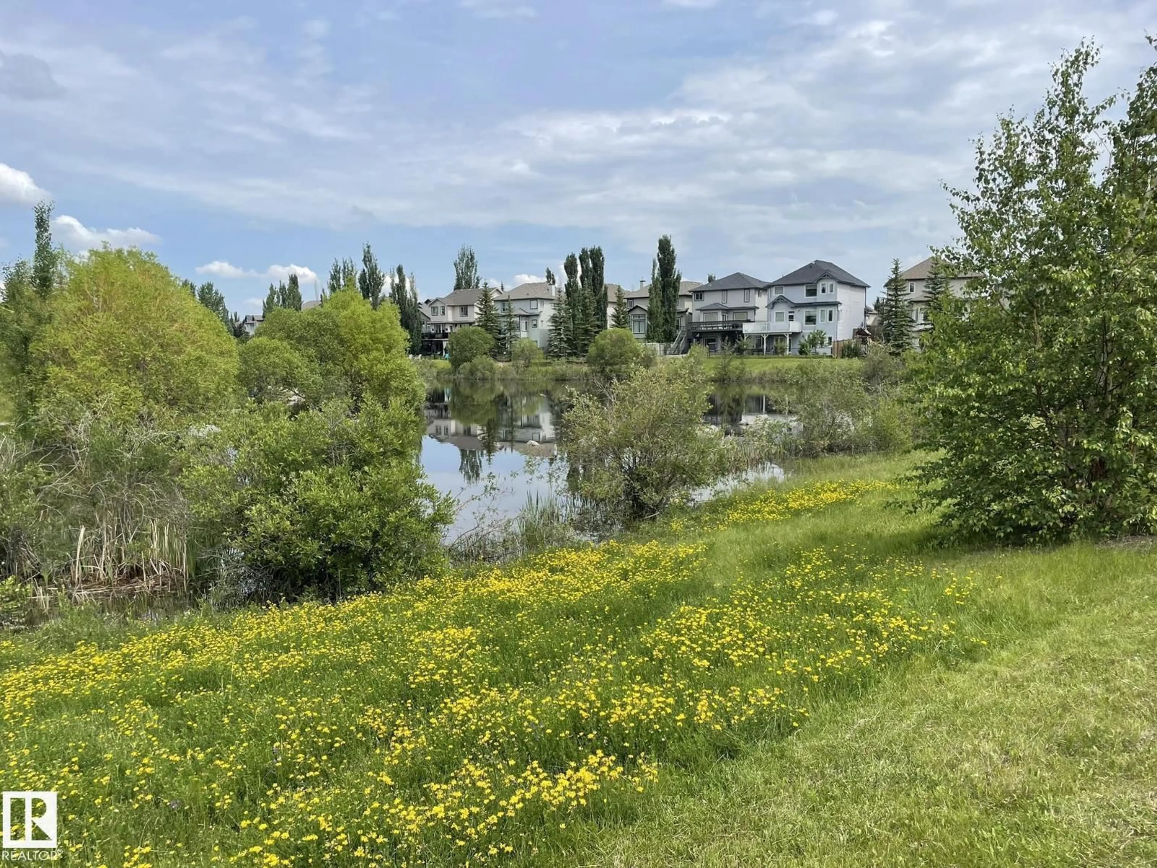 A pic from outside/outdoor area/front of a property/back of a property/a pic from drone, water/lake/river/ocean view for 207 - 7021 SOUTH TERWILLEGAR DR, Edmonton Alberta T6R0W5