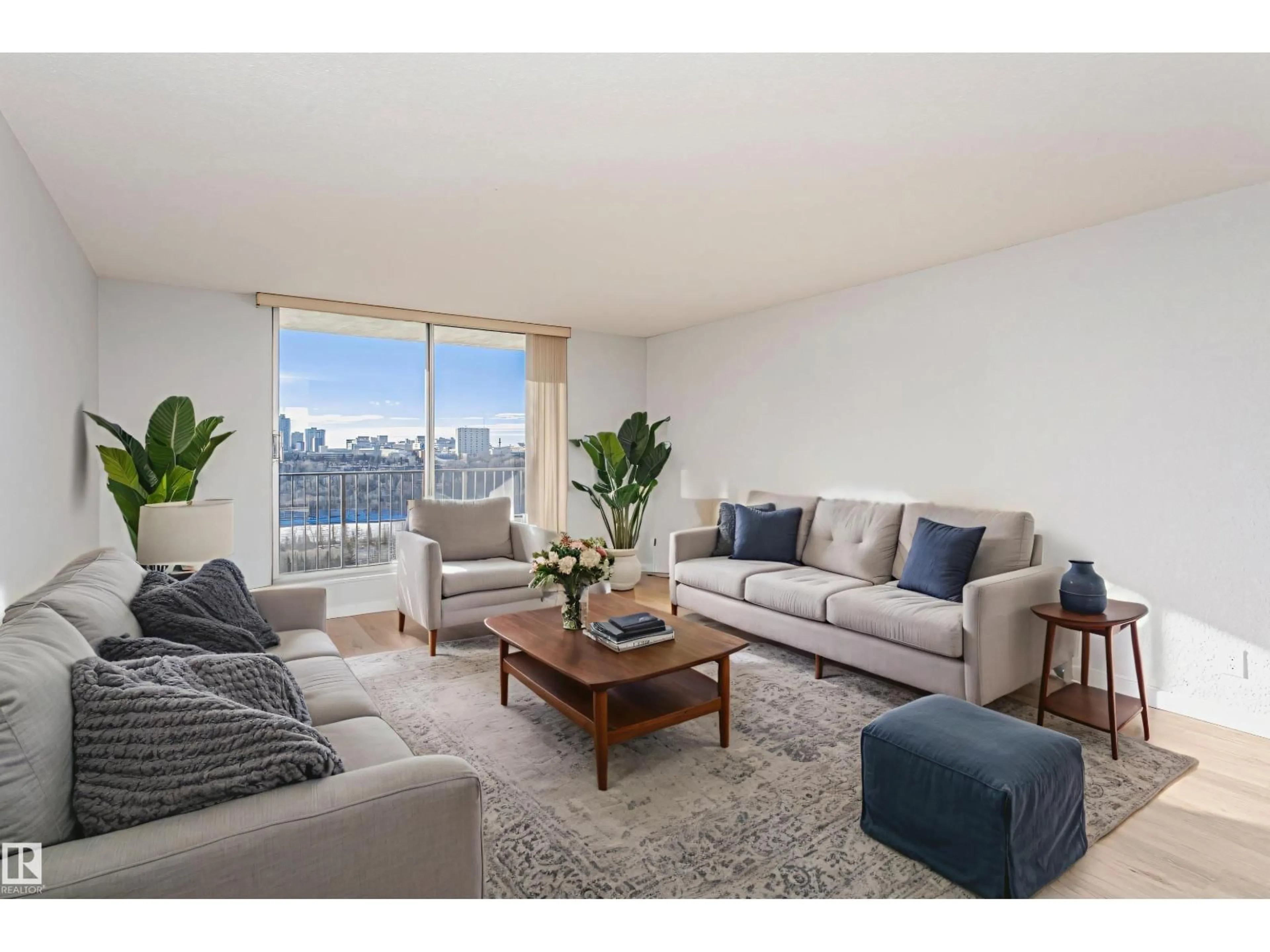 Living room with furniture, unknown for 11307 NW - 1004 99 AV, Edmonton Alberta T5K0H2