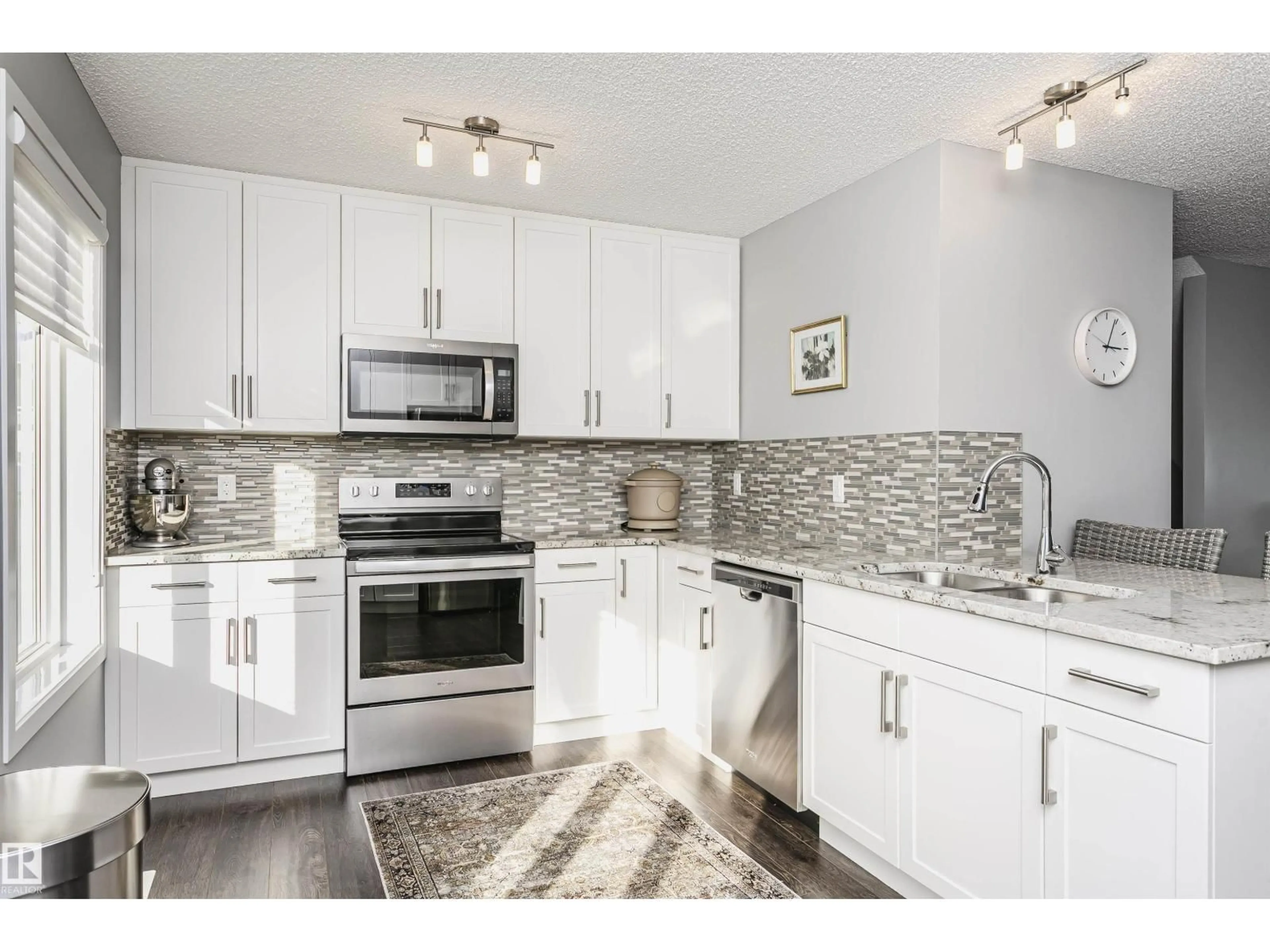 Open concept kitchen, unknown for 56 - 2905 141 ST, Edmonton Alberta T6W3M4