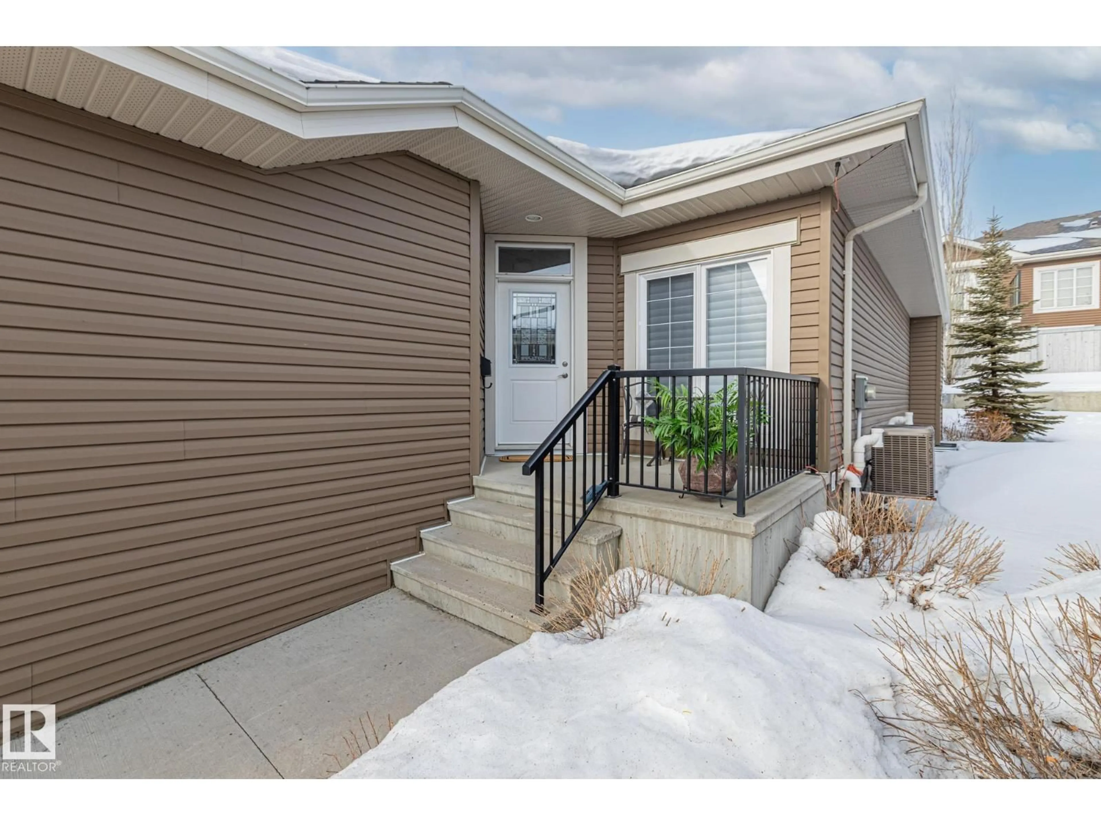 Home with vinyl exterior material, street for 8 - 18 LYNX CL, St. Albert Alberta T8N5T2