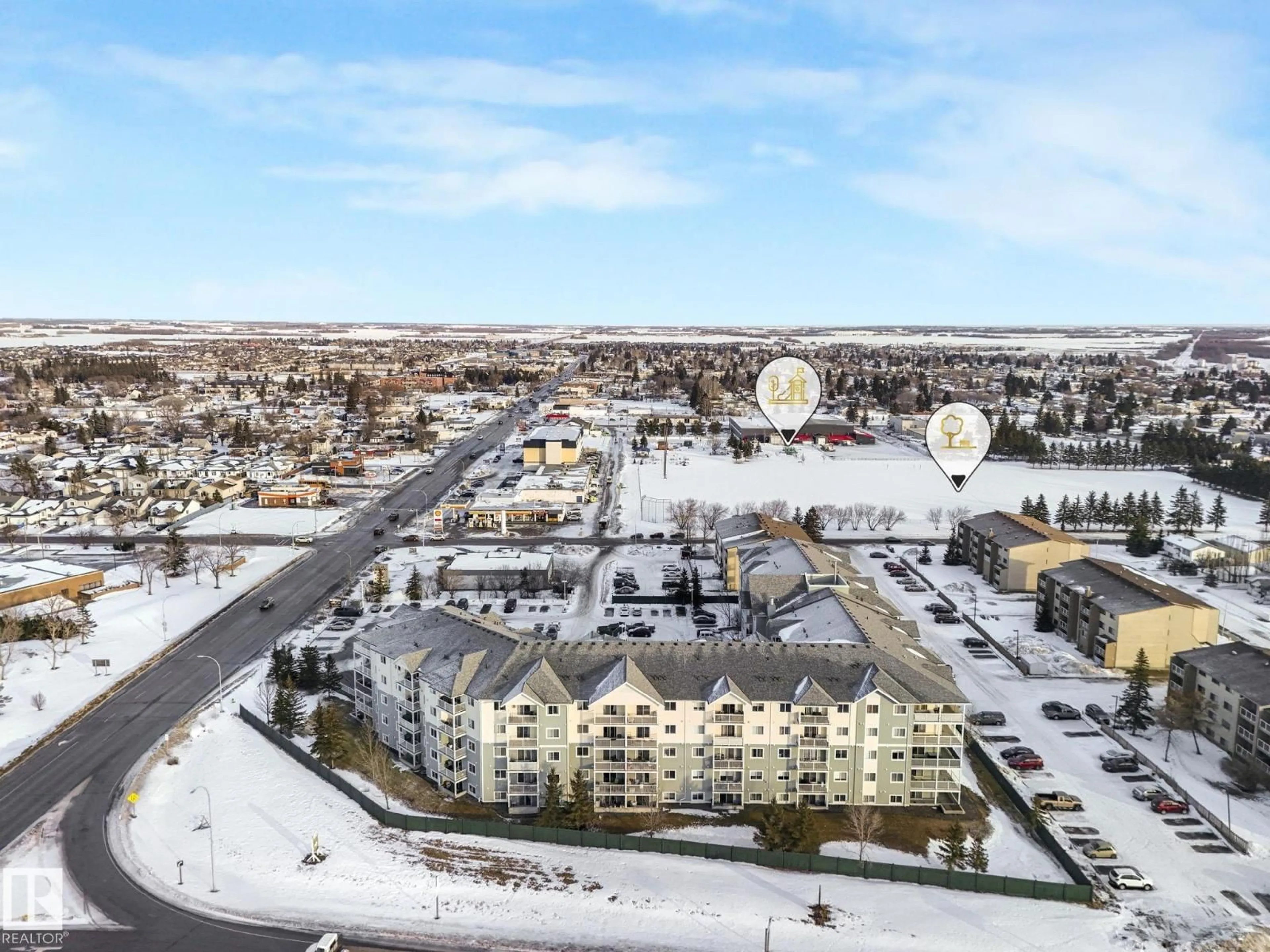 A pic from outside/outdoor area/front of a property/back of a property/a pic from drone, city buildings view from balcony for #504 - 9910 107 ST, Morinville Alberta T8R1P7