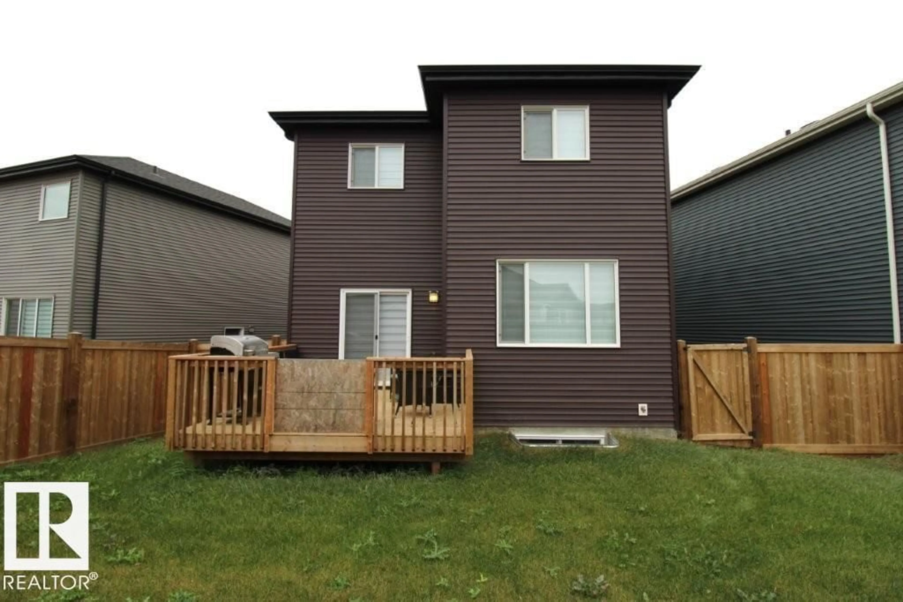 Home with vinyl exterior material, street for NW - 22140 81 AV, Edmonton Alberta T5T7R6