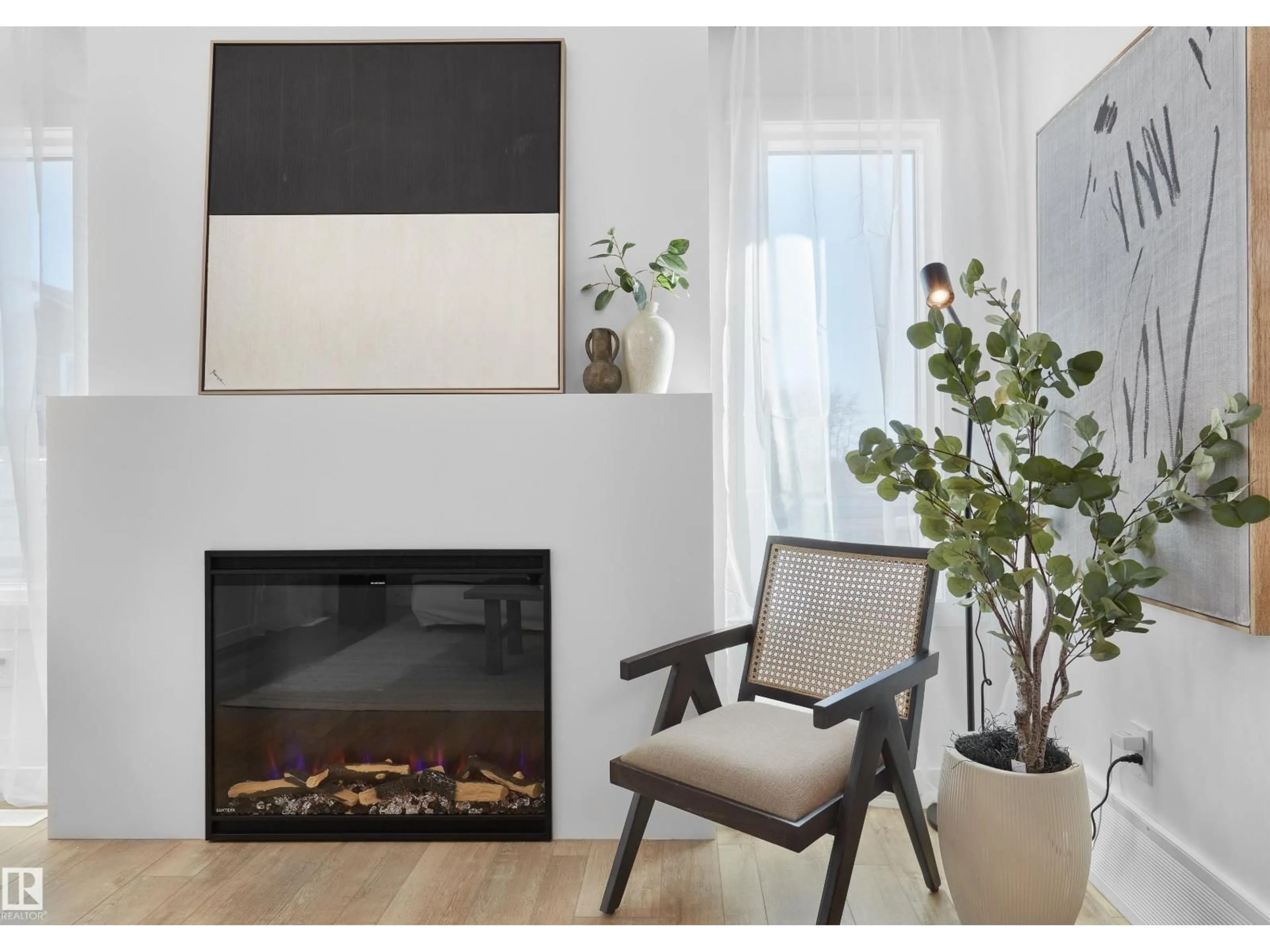 Living room with furniture, wood/laminate floor for 276 MARQUIS BV, Edmonton Alberta T5Y4E7