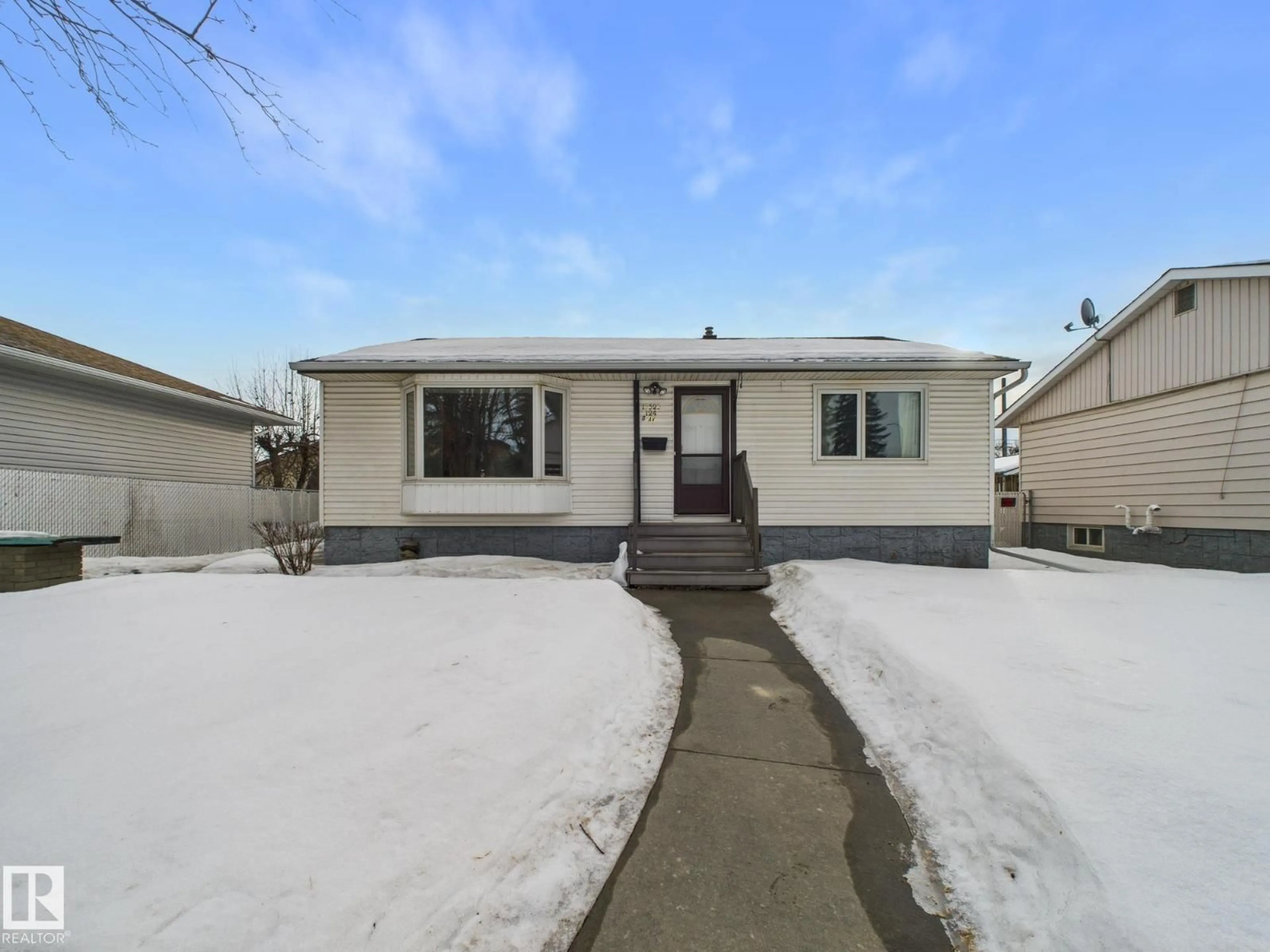 Home with vinyl exterior material, street for NW - 13523 124B AV, Edmonton Alberta T5L3B6