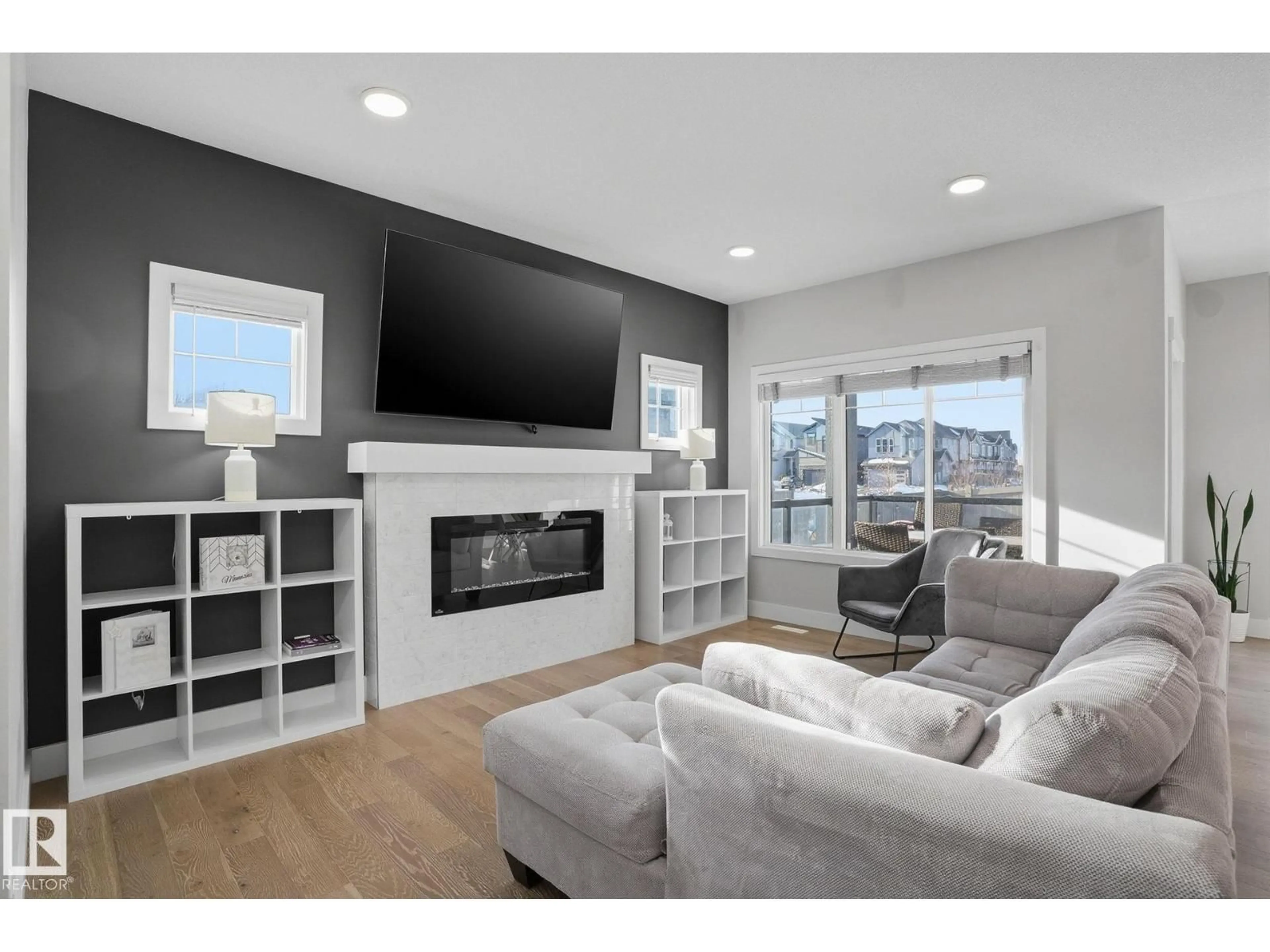 Living room with furniture, wood/laminate floor for 9723 223 ST, Edmonton Alberta T5T7B6