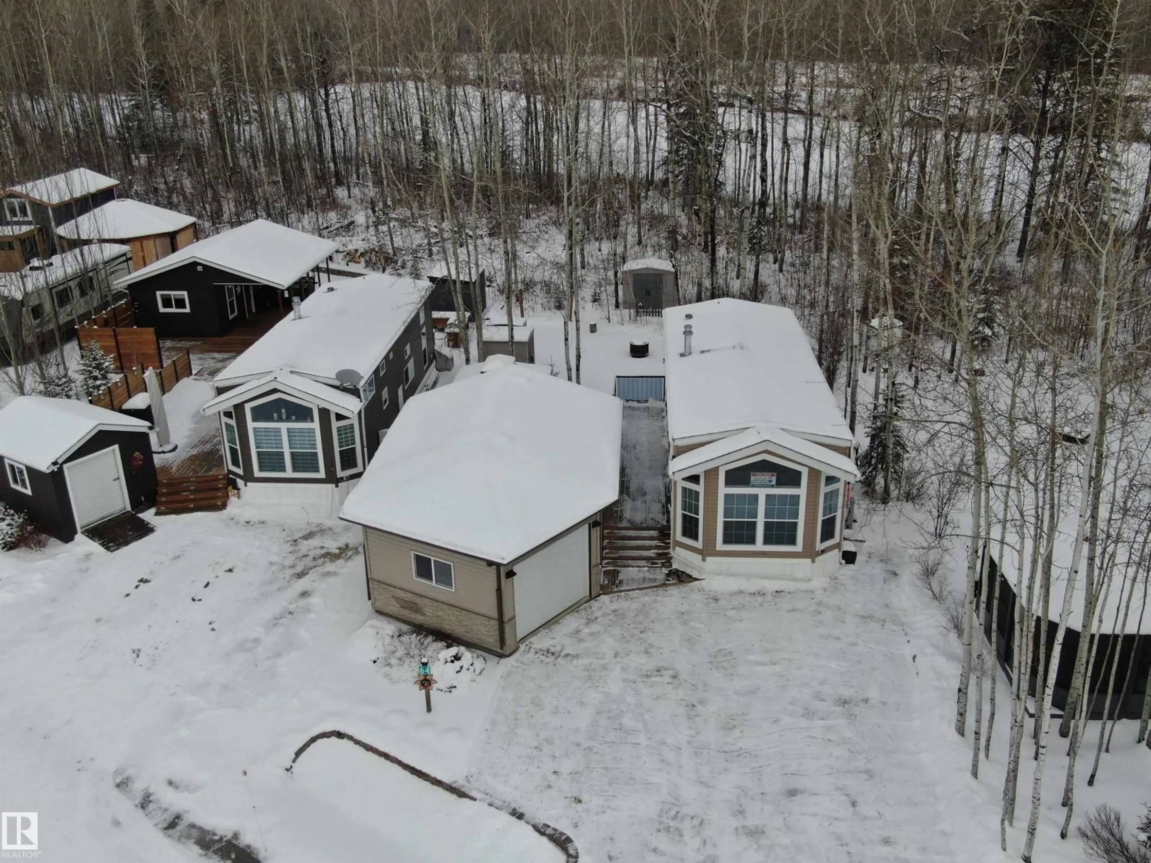 A pic from outside/outdoor area/front of a property/back of a property/a pic from drone, unknown for 53206 - 64 RGE ROAD 55 A, Rural Parkland County Alberta T0E2B0