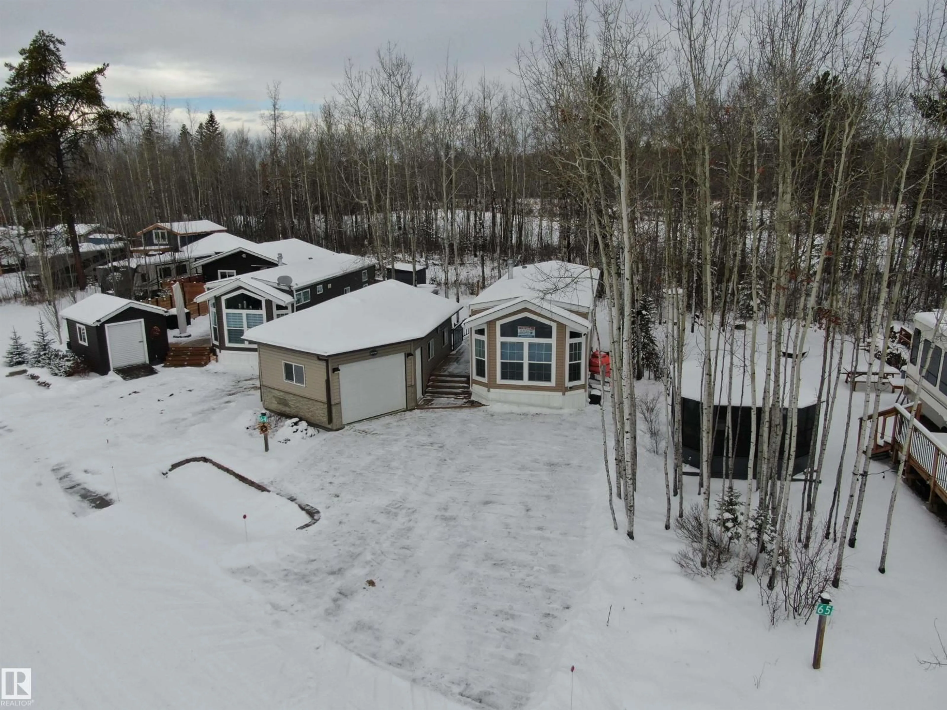 A pic from outside/outdoor area/front of a property/back of a property/a pic from drone, unknown for 53206 - 64 RGE ROAD 55 A, Rural Parkland County Alberta T0E2B0