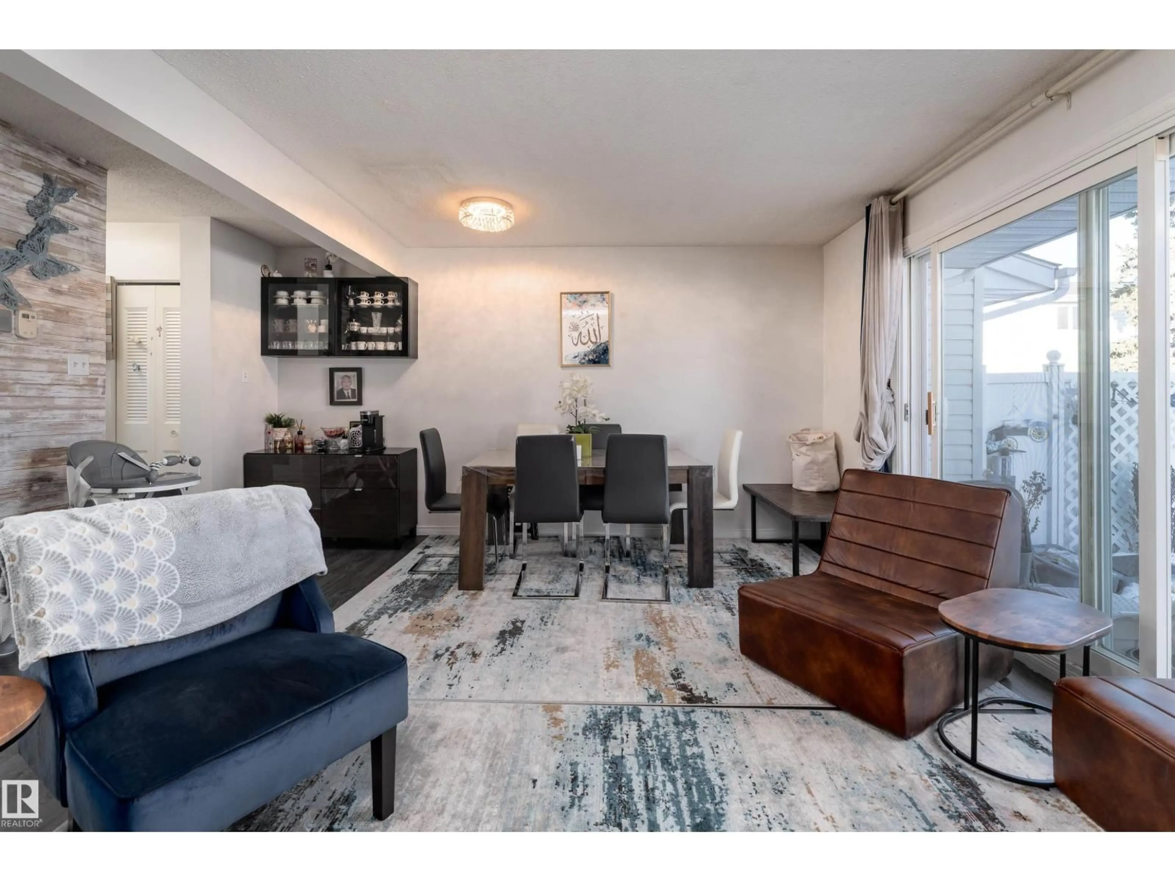 Living room with furniture, unknown for 11454 139 AV, Edmonton Alberta T5X3L3