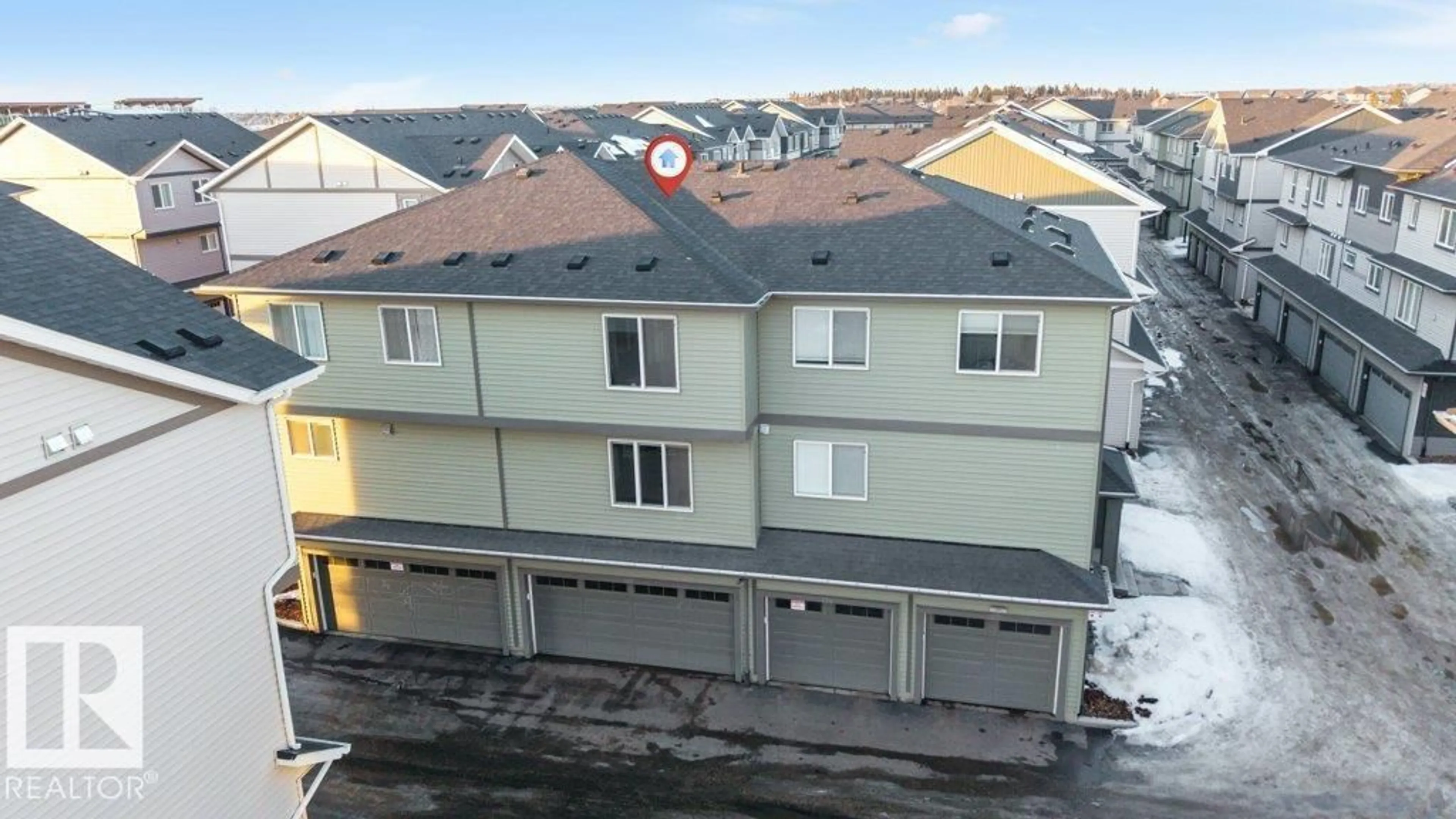 A pic from outside/outdoor area/front of a property/back of a property/a pic from drone, building for 1530 - 125 TAMARACK BV, Edmonton Alberta T6T2E6